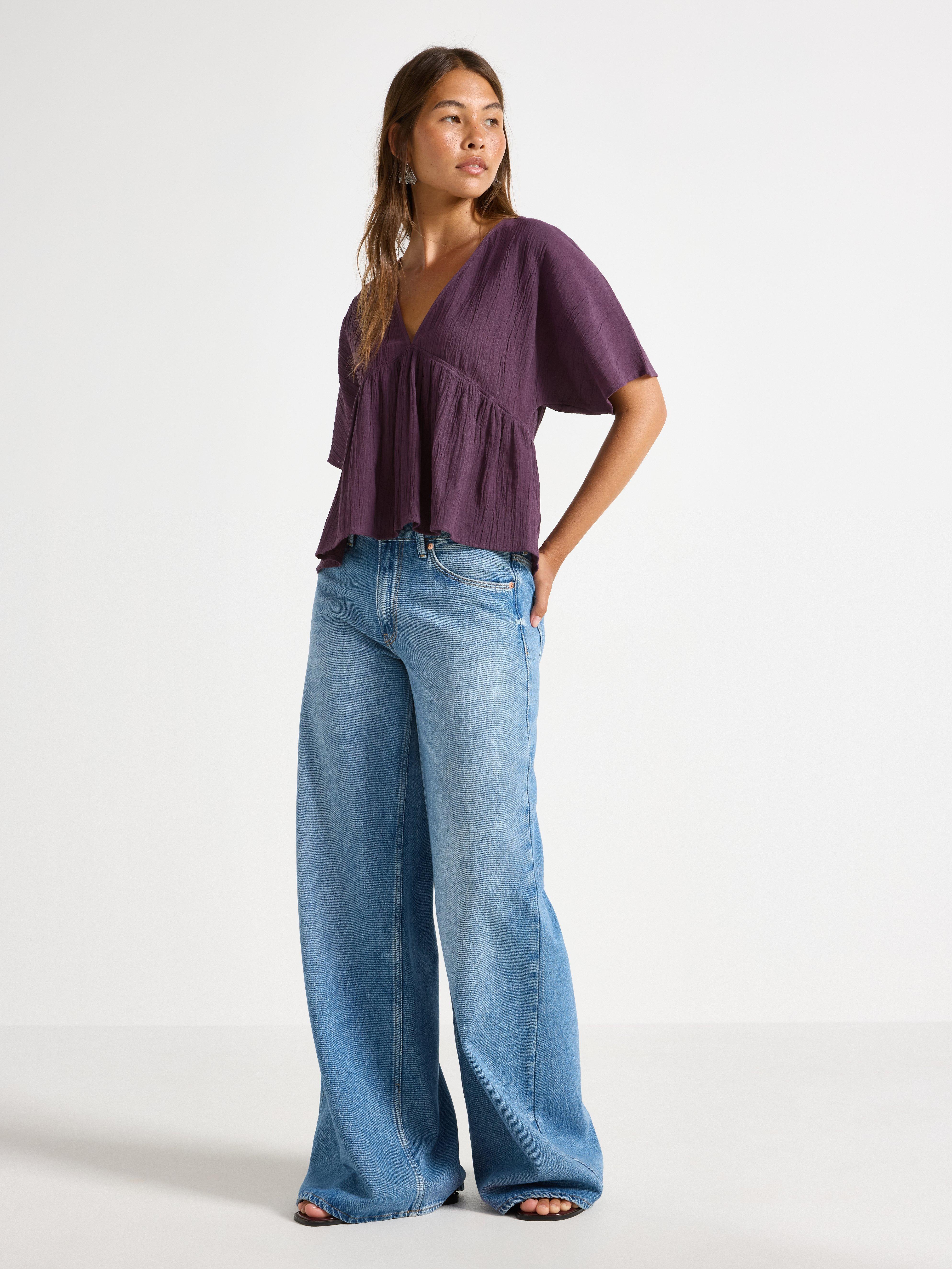 Blusa de manga corta color lila oscuro empolvado