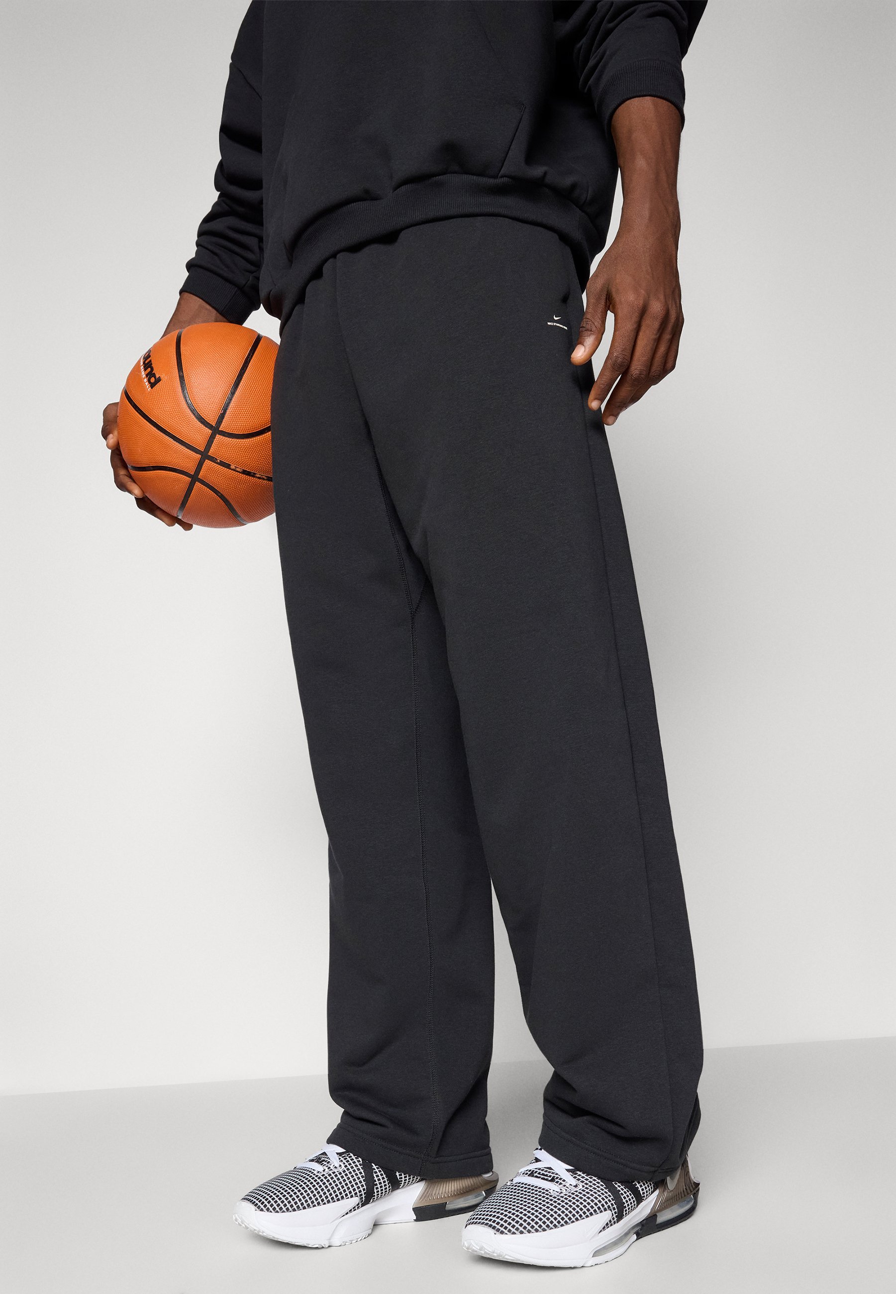 Nike Performance OPEN HEM PANT - Trainingsbroek - zwart/licht ivoor