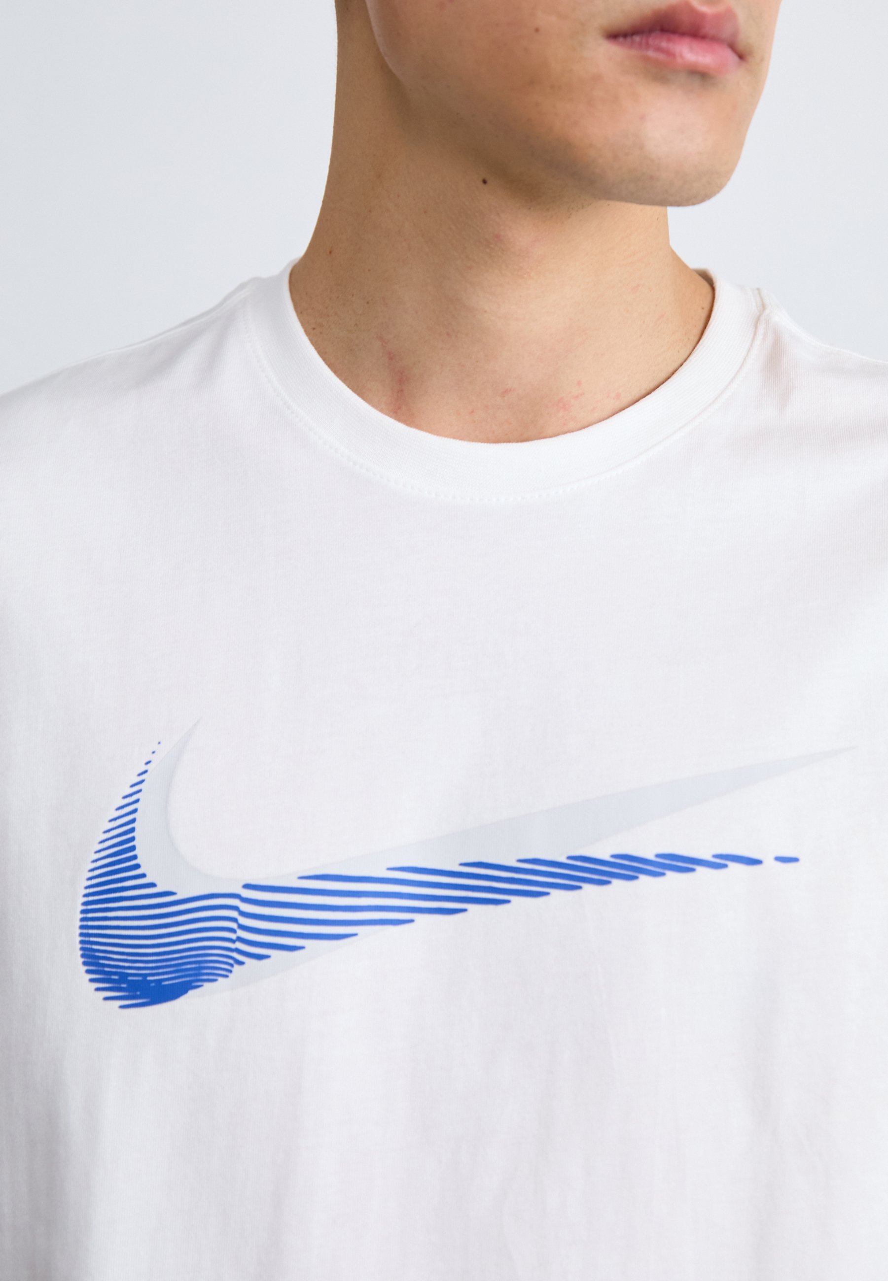 Nike Sportswear -printtipaidat
