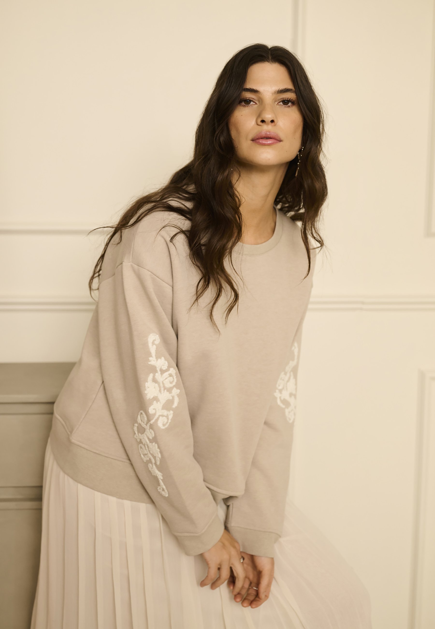 Crèmekleurige sweater - string melange