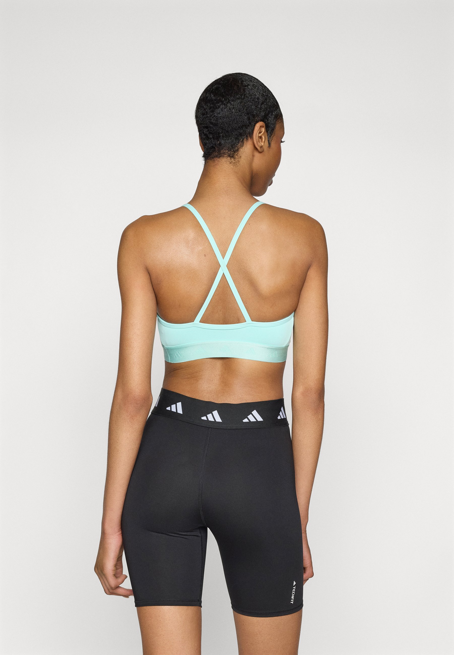 adidas Performance HYPERGLAM BRALETTE - Biustonosz sportowy o lekkim wsparciu - semi flash aqua/white