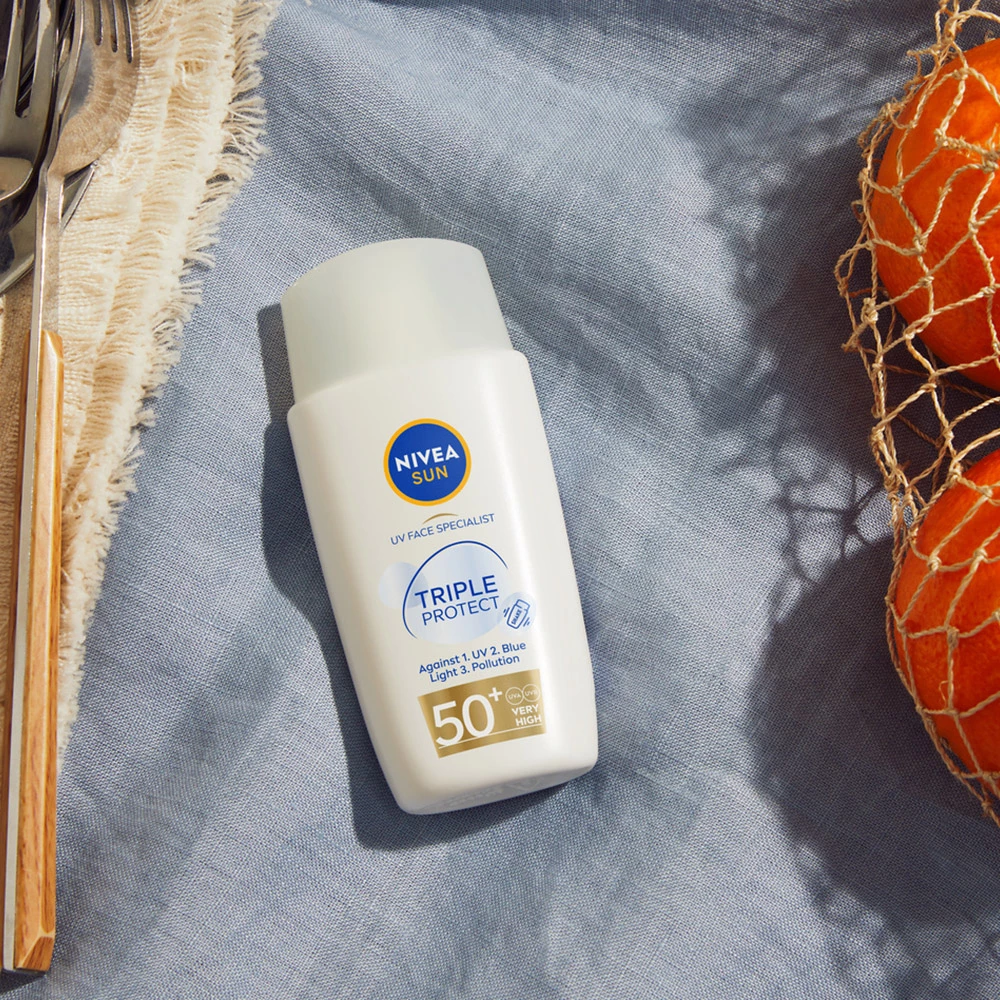 Fluid de protecție UV pentru față cu triplă protecție SPF 50+ 40 ml - NIVEA