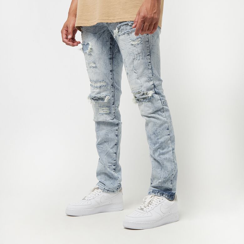 Gebleekt, gewassen, gescheurde en gerepareerde jeans