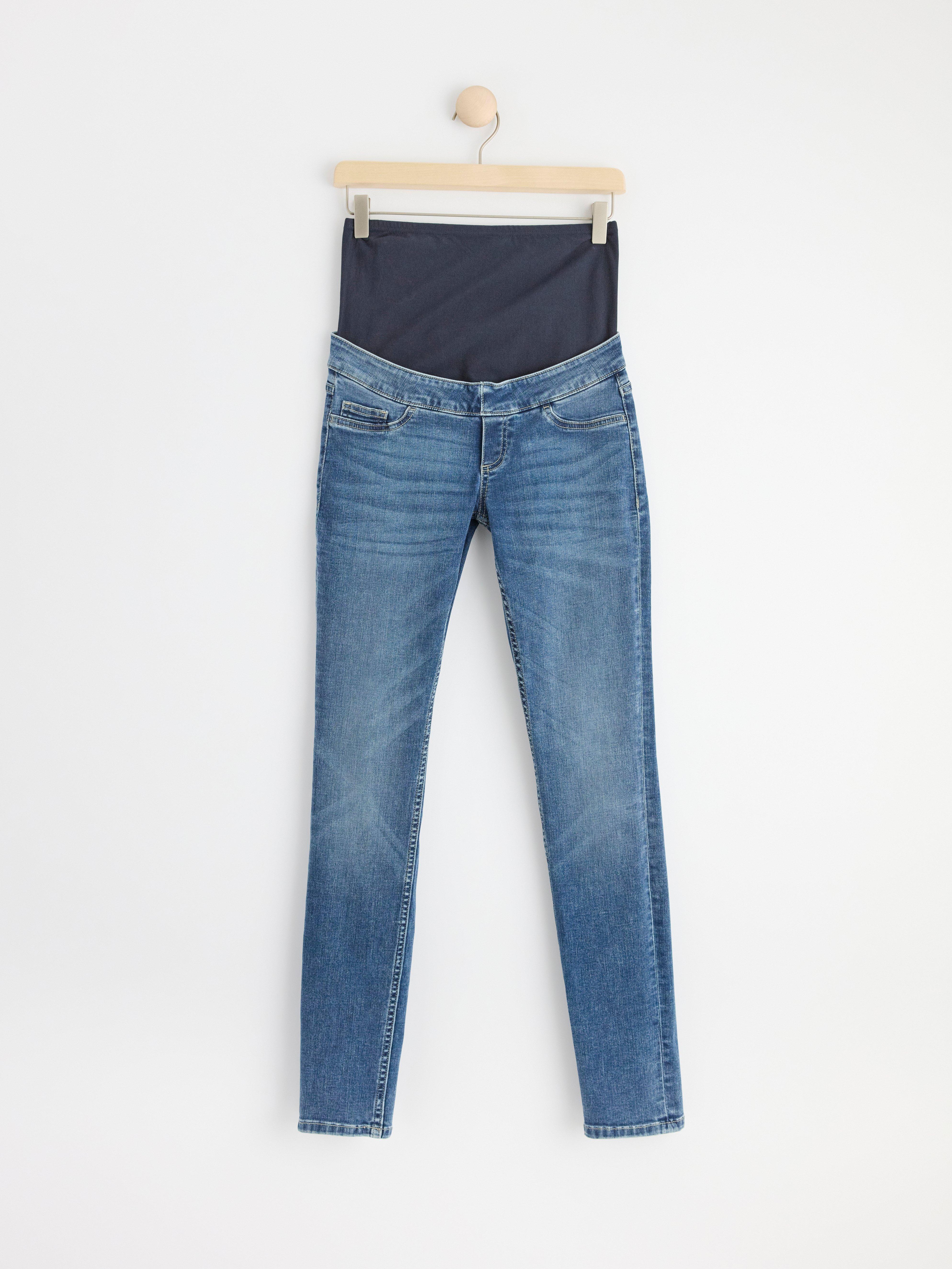 MOM SLIM Vaqueros premamá de tacto suave y denim ligero.