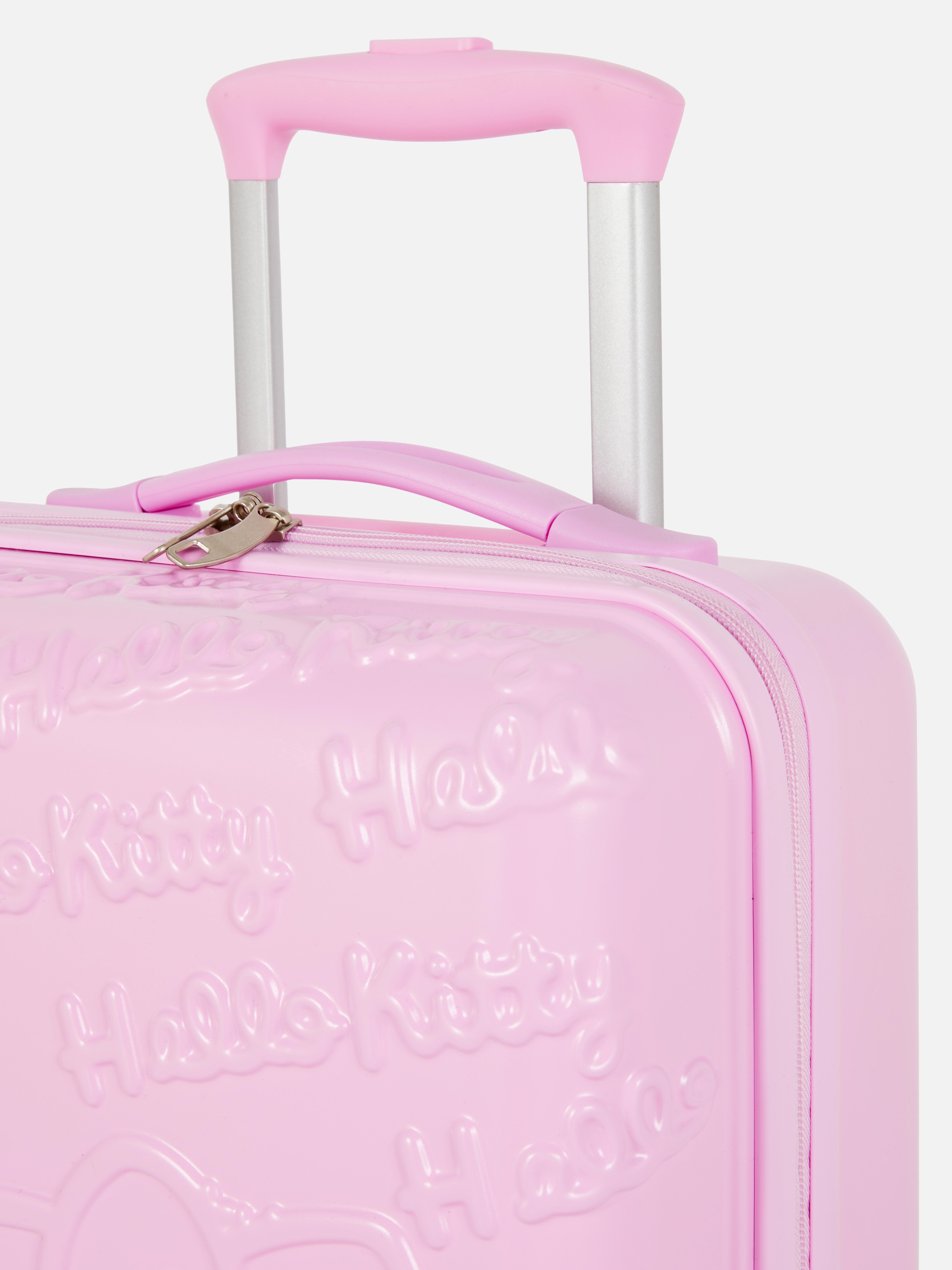 Valiză rigidă cu 4 roți Hello Kitty Această valiză rigidă prezintă modele drăguțe în relief cu Hello Kitty