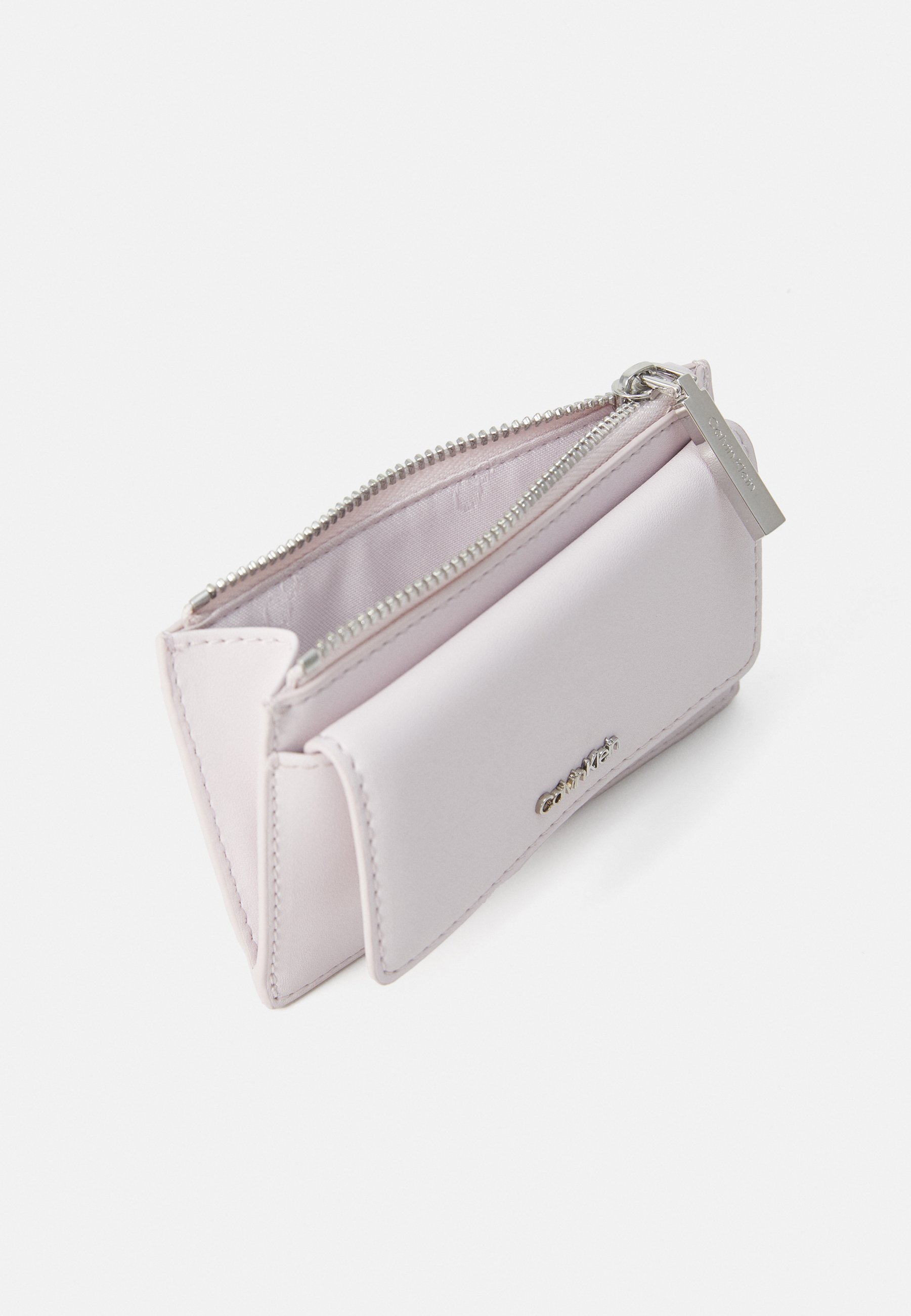 Calvin Klein MUST HOLDER ZIP - Portemonnee - orchidee ijs