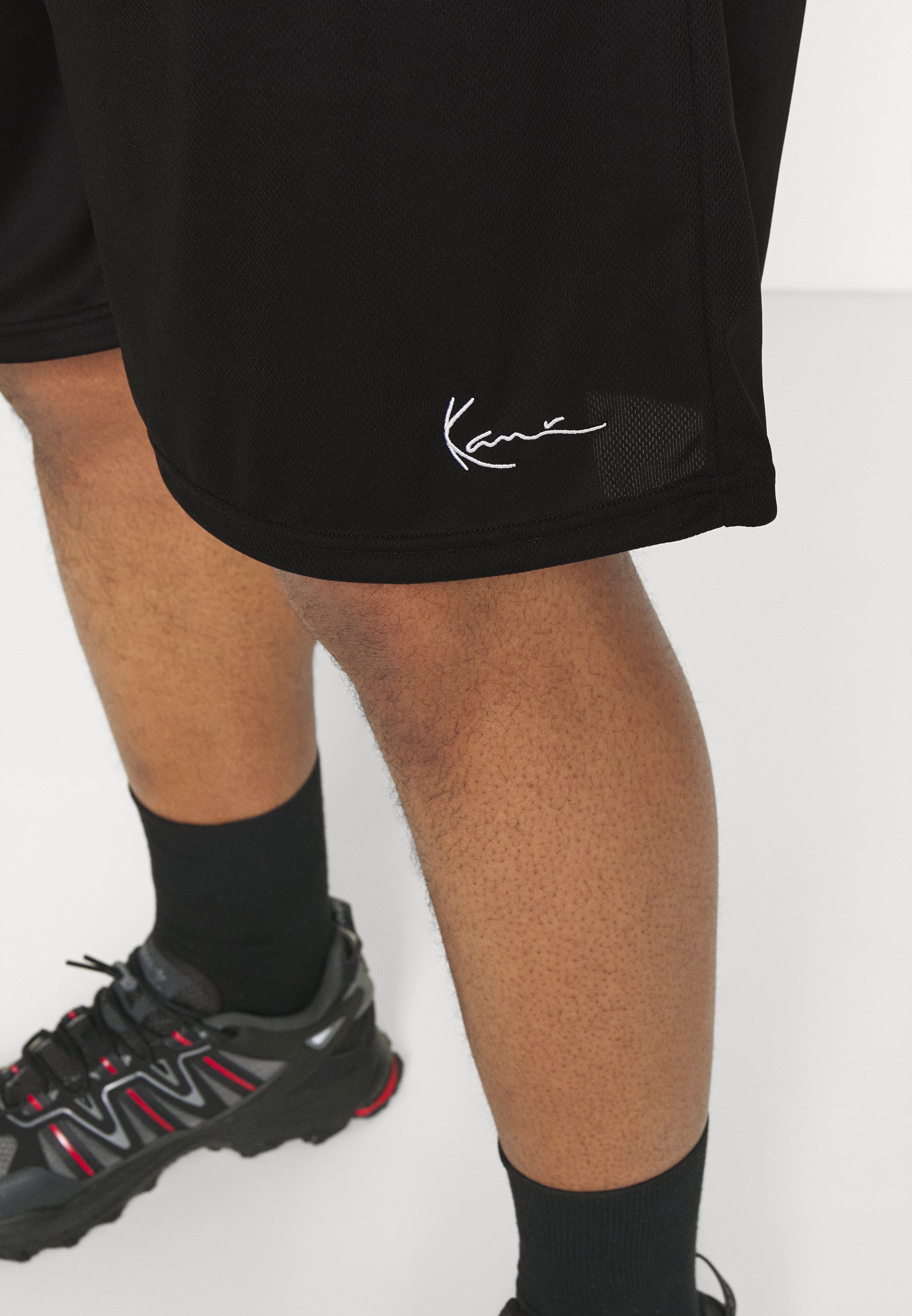 Bas de survêtement Karl Kani SMALL SIGNATURE - noir