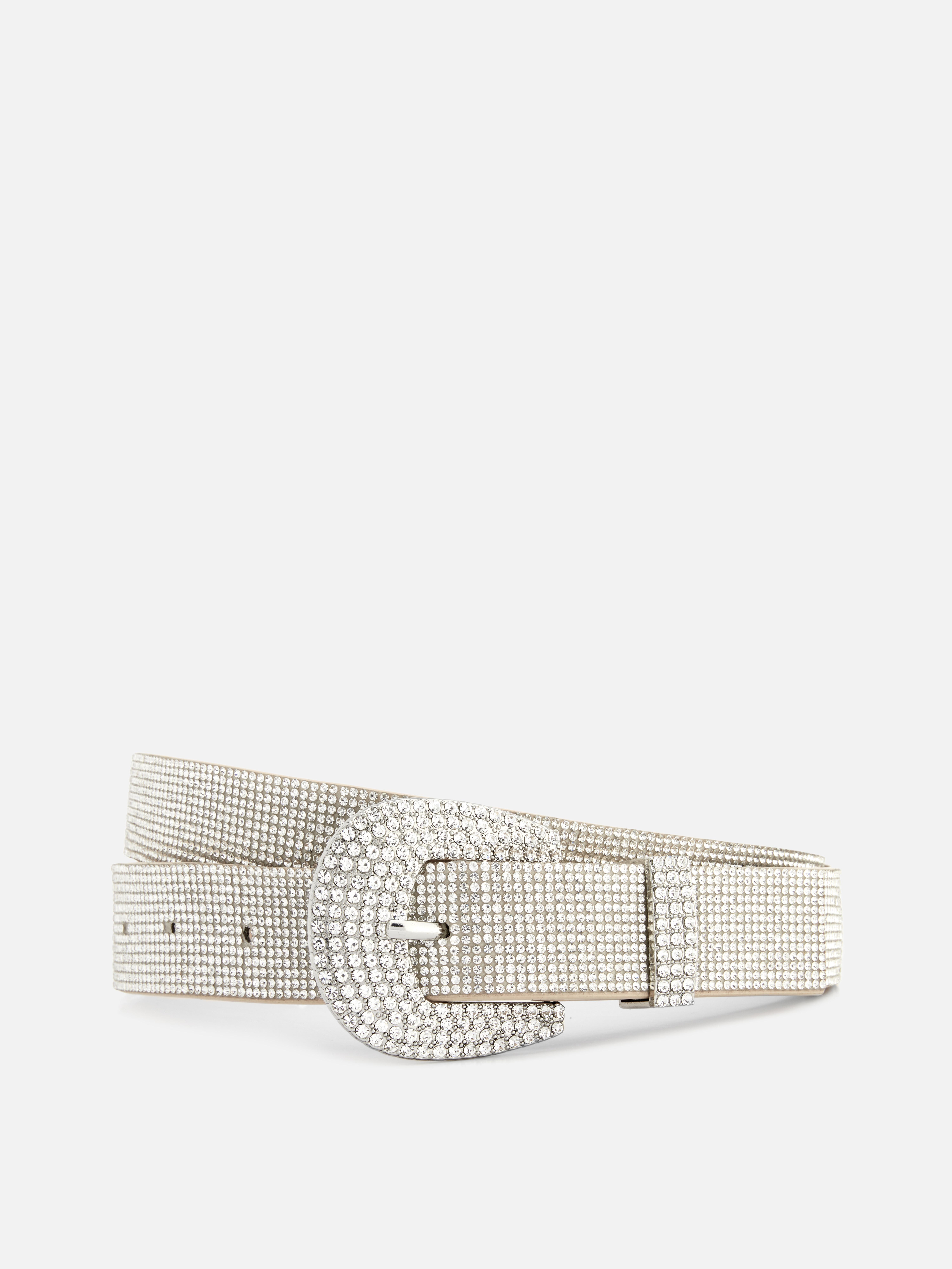 Cintura con fibbia glitterata. Con questa scintillante cintura con strass e una fibbia vistosa, non passerai di certo inosservata.