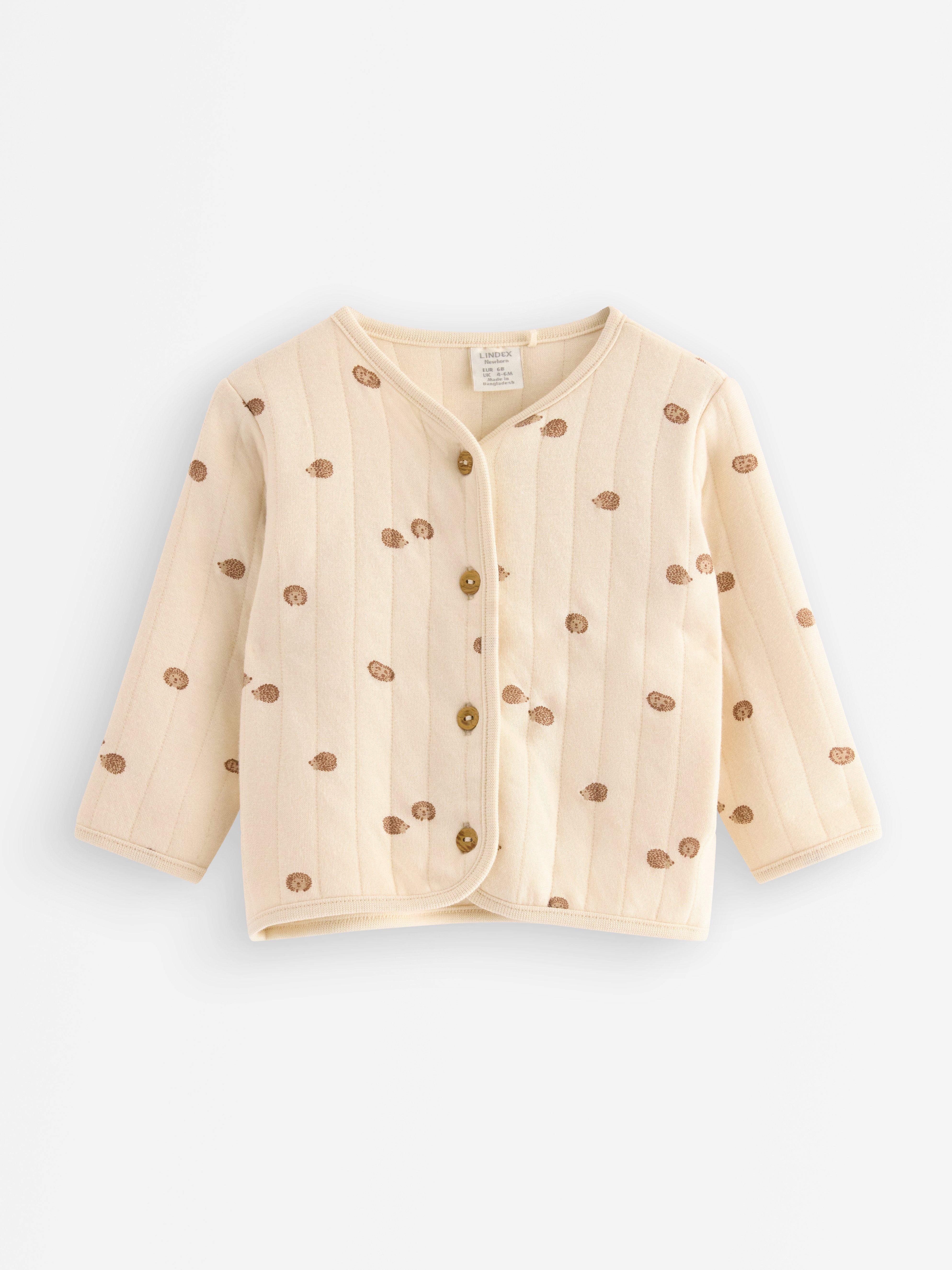 Giacca trapuntata in tricot beige chiaro