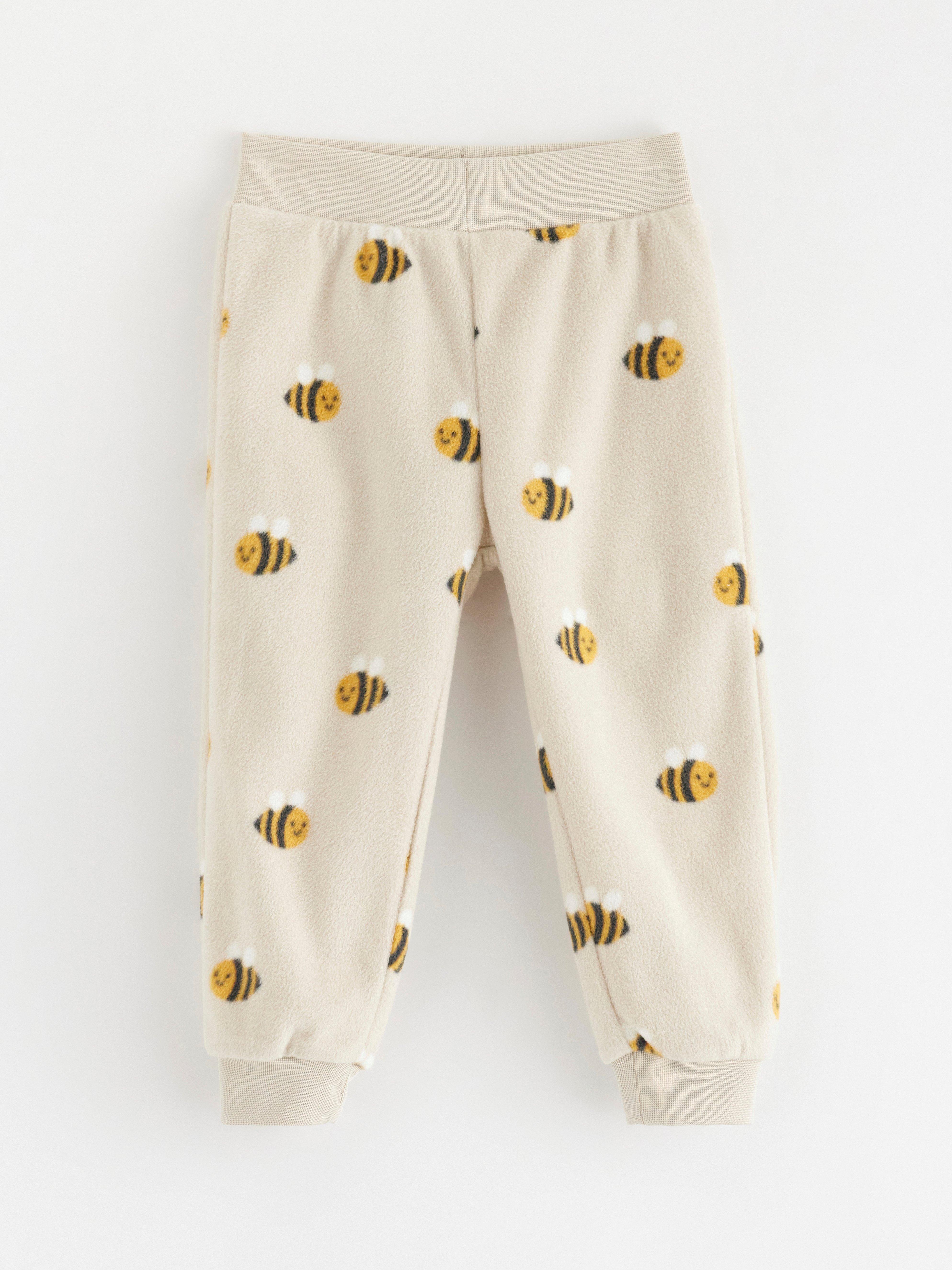 Pantalones deportivos de felpa color beige claro