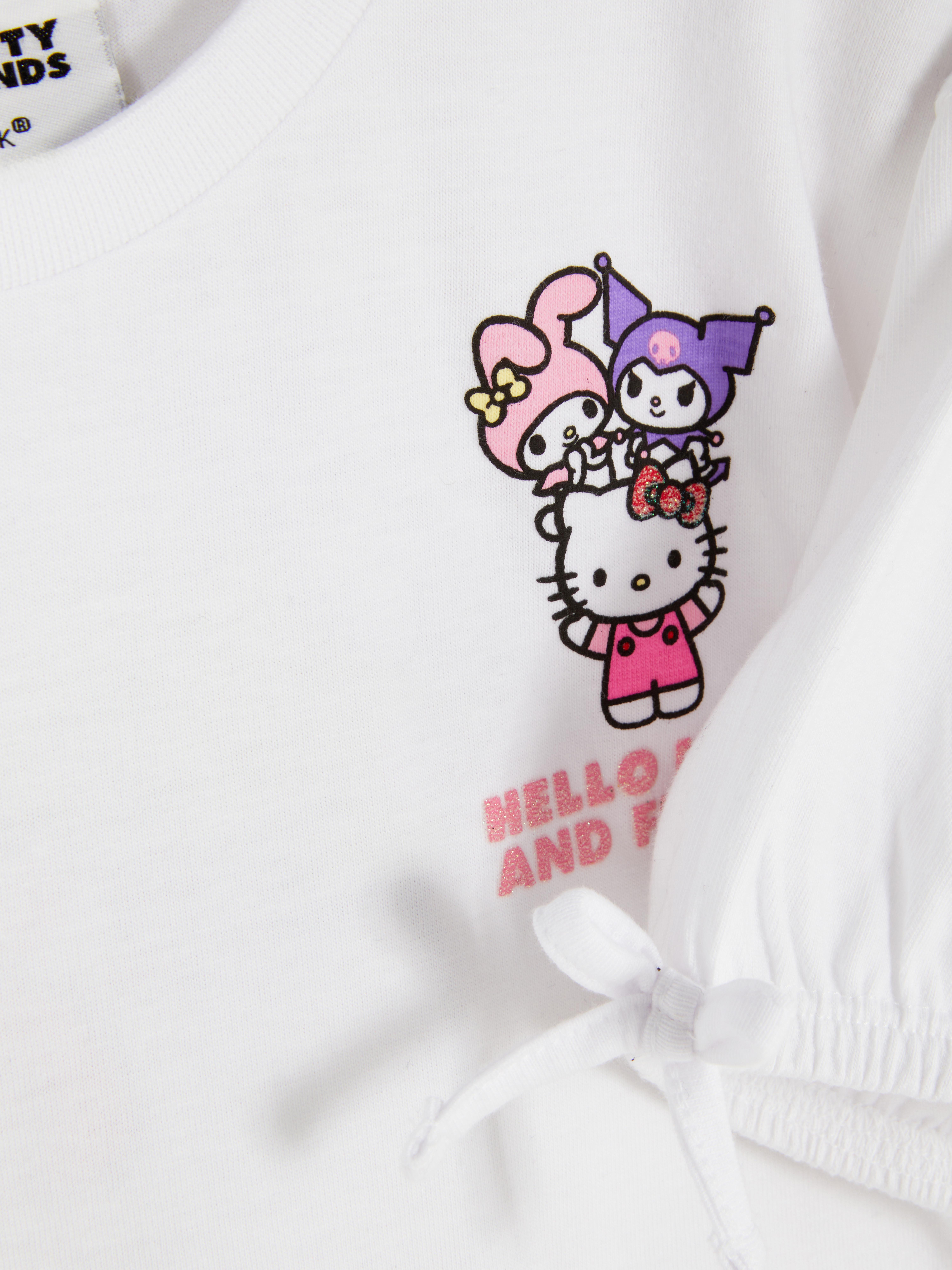 Hello Kitty und Freunde Kurzarm-T-Shirt Ein T-Shirt mit Rundhalsausschnitt, Schleifenbündchen und Hello Kitty-Aufdruck auf Vorder- und Rückseite