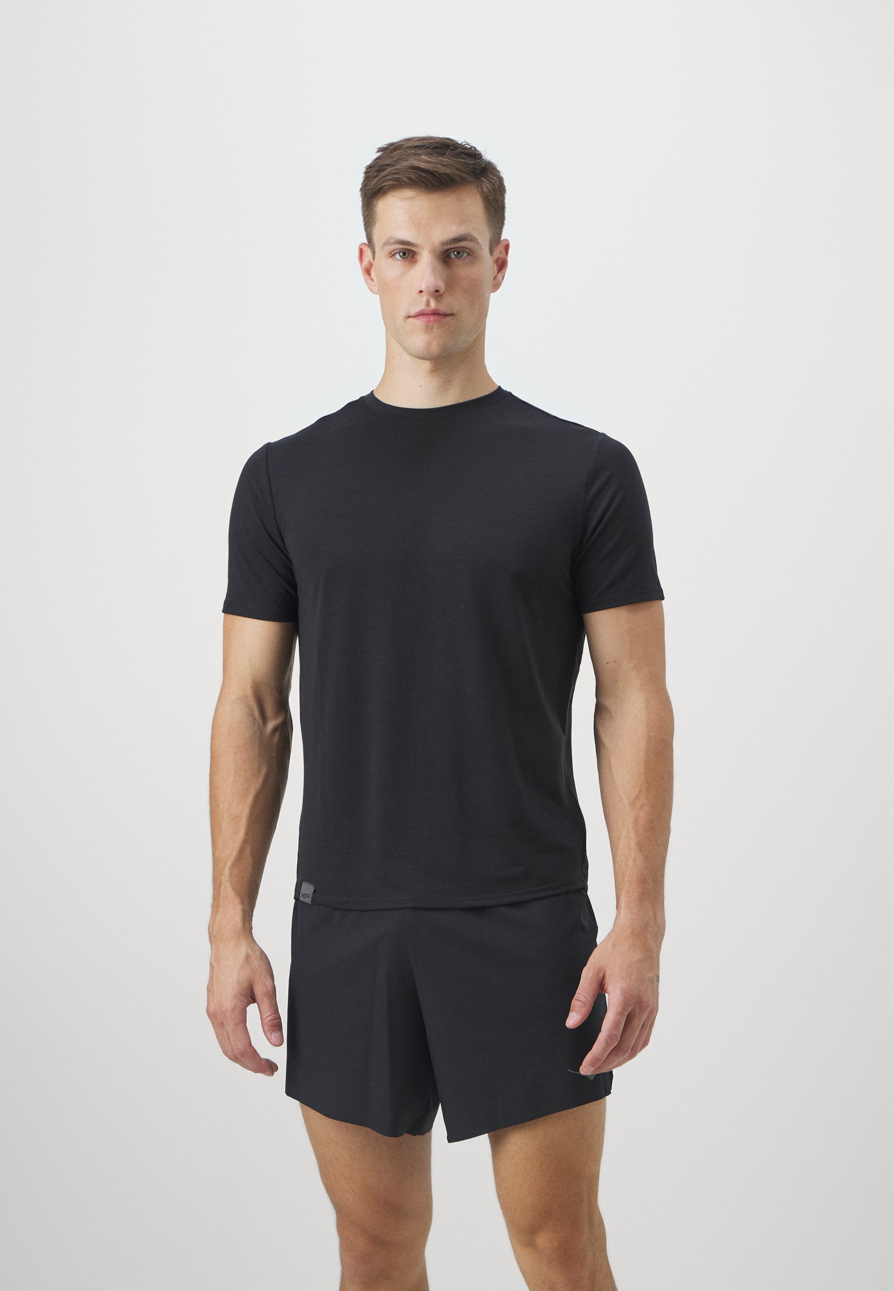 T-shirt HOKA ESSENTIAL - T-shirt de sport - noir
