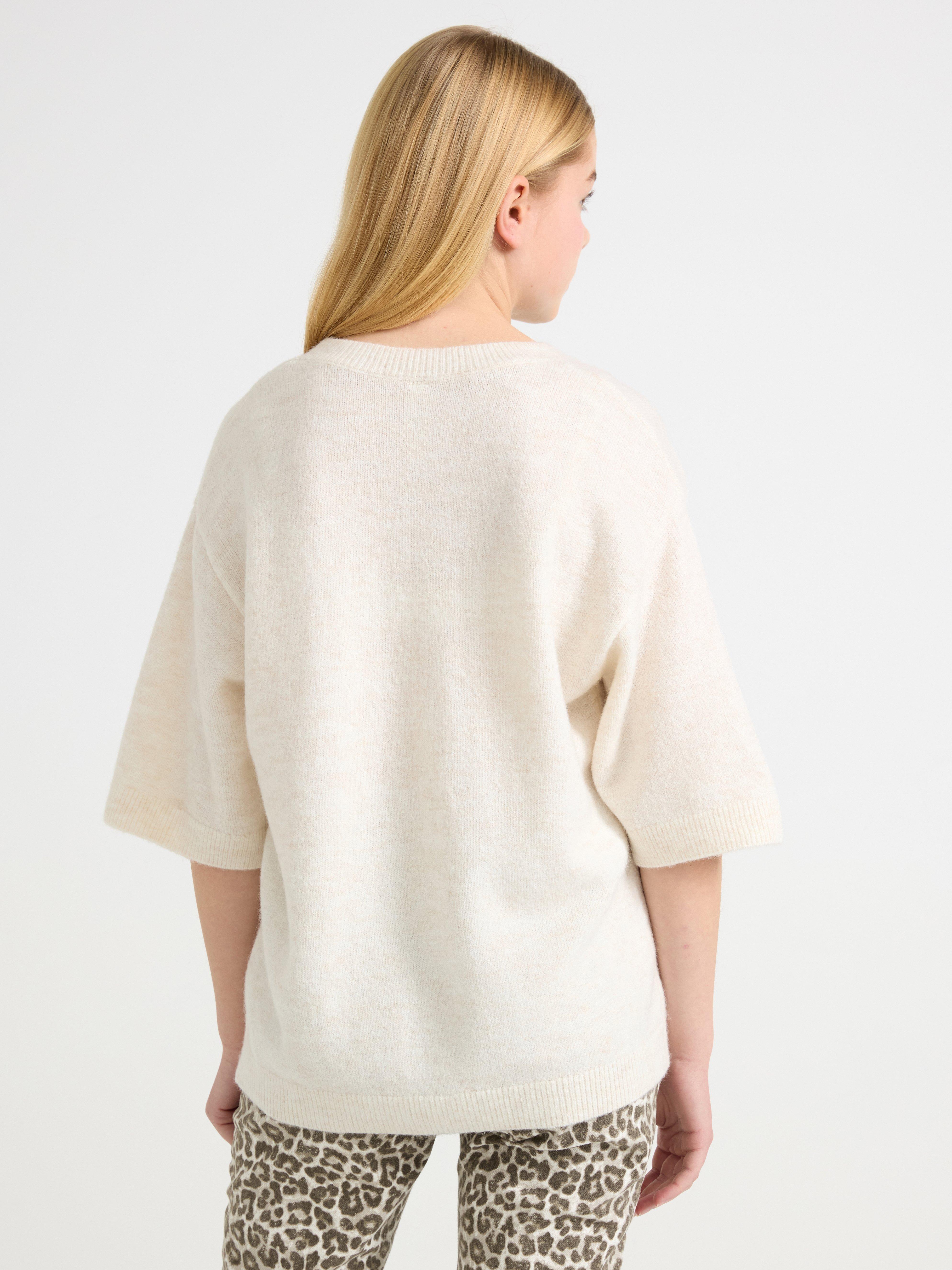 Jersey de punto de manga corta color beige claro jaspeado