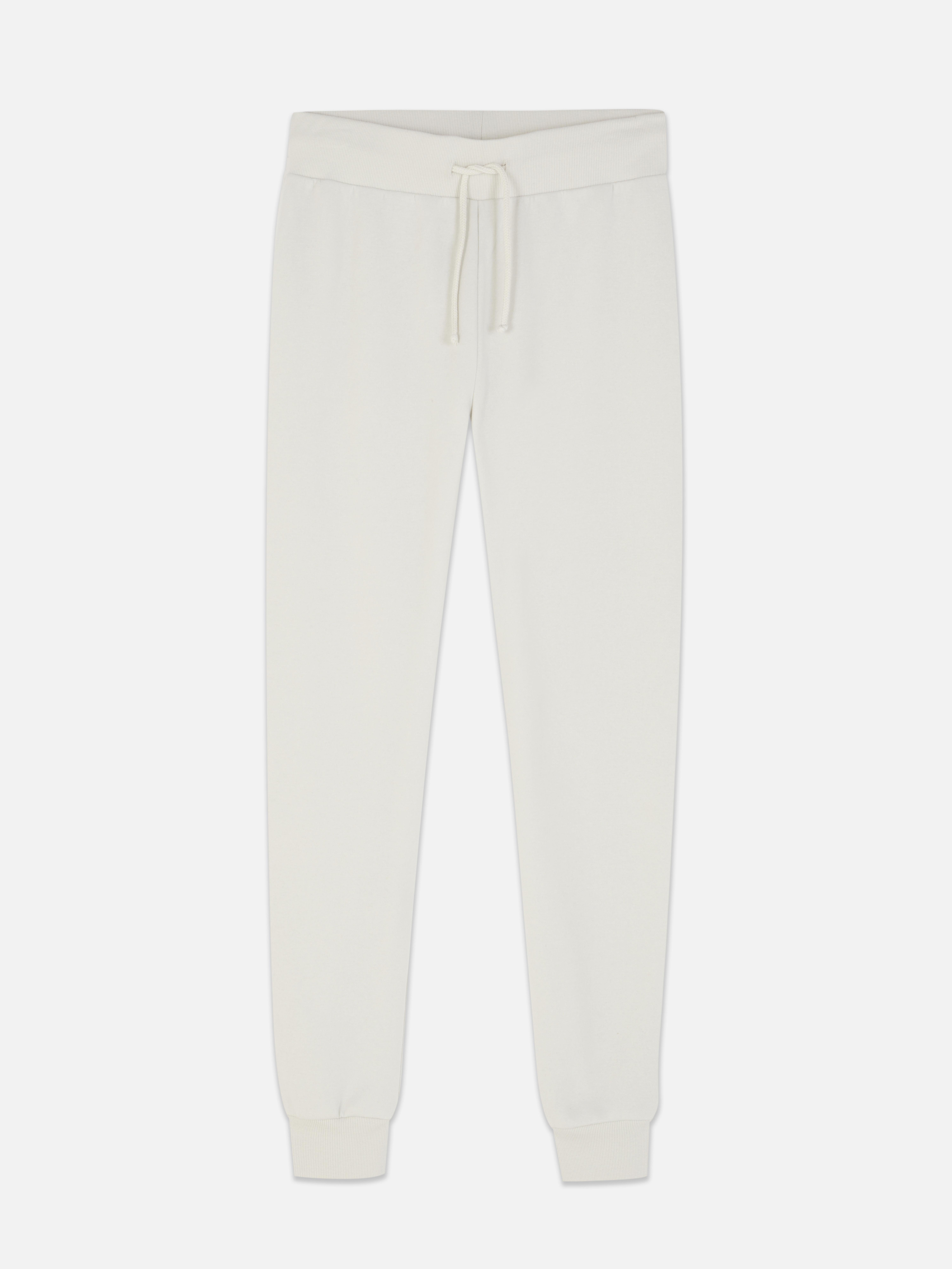 Pantaloni de trening skinny Acești pantaloni de trening slim fit cu manșete la gleznă creează un aspect elegant pentru momente elegante și zile active.