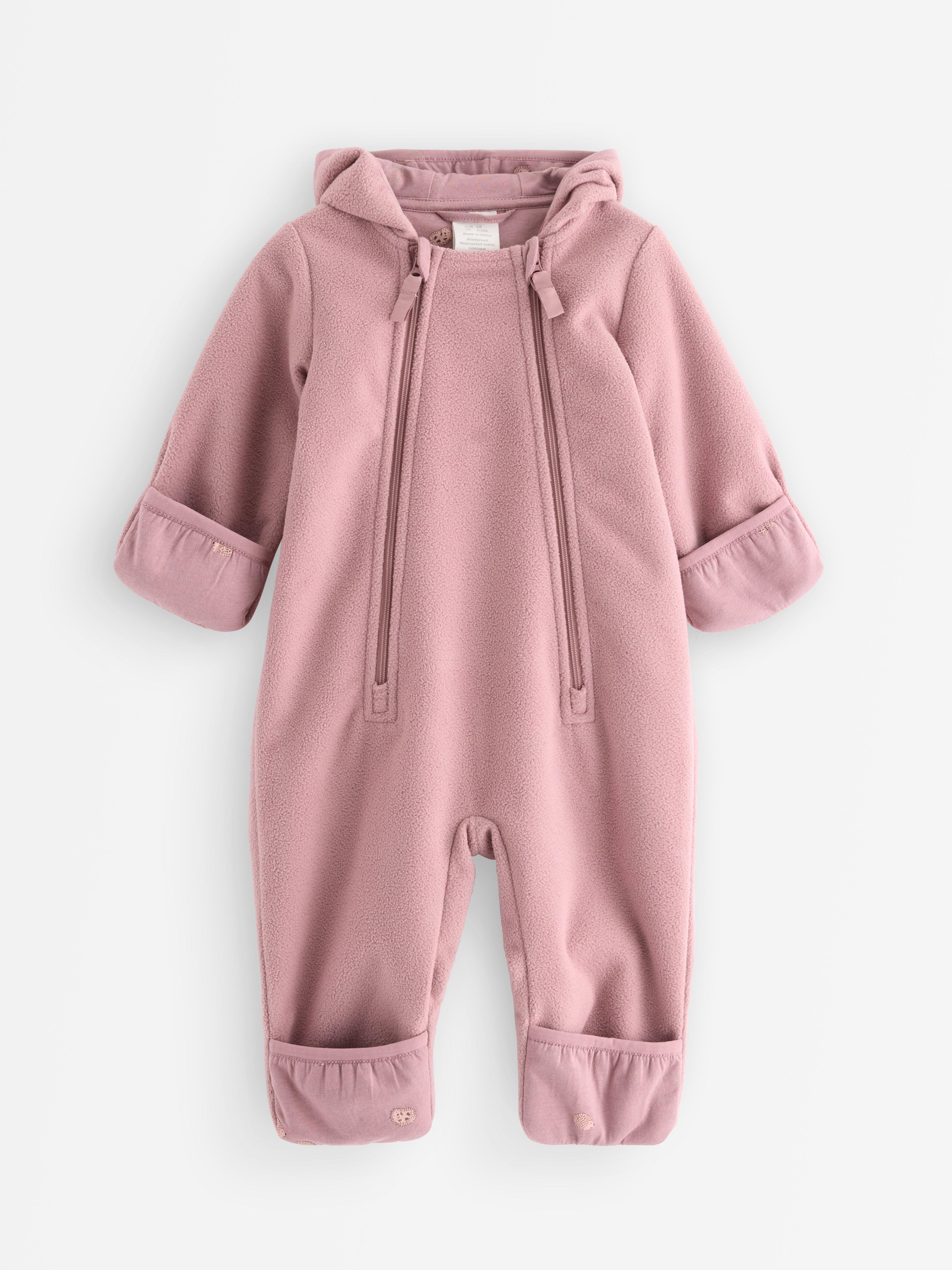 Combinaison en polaire rose poudré clair