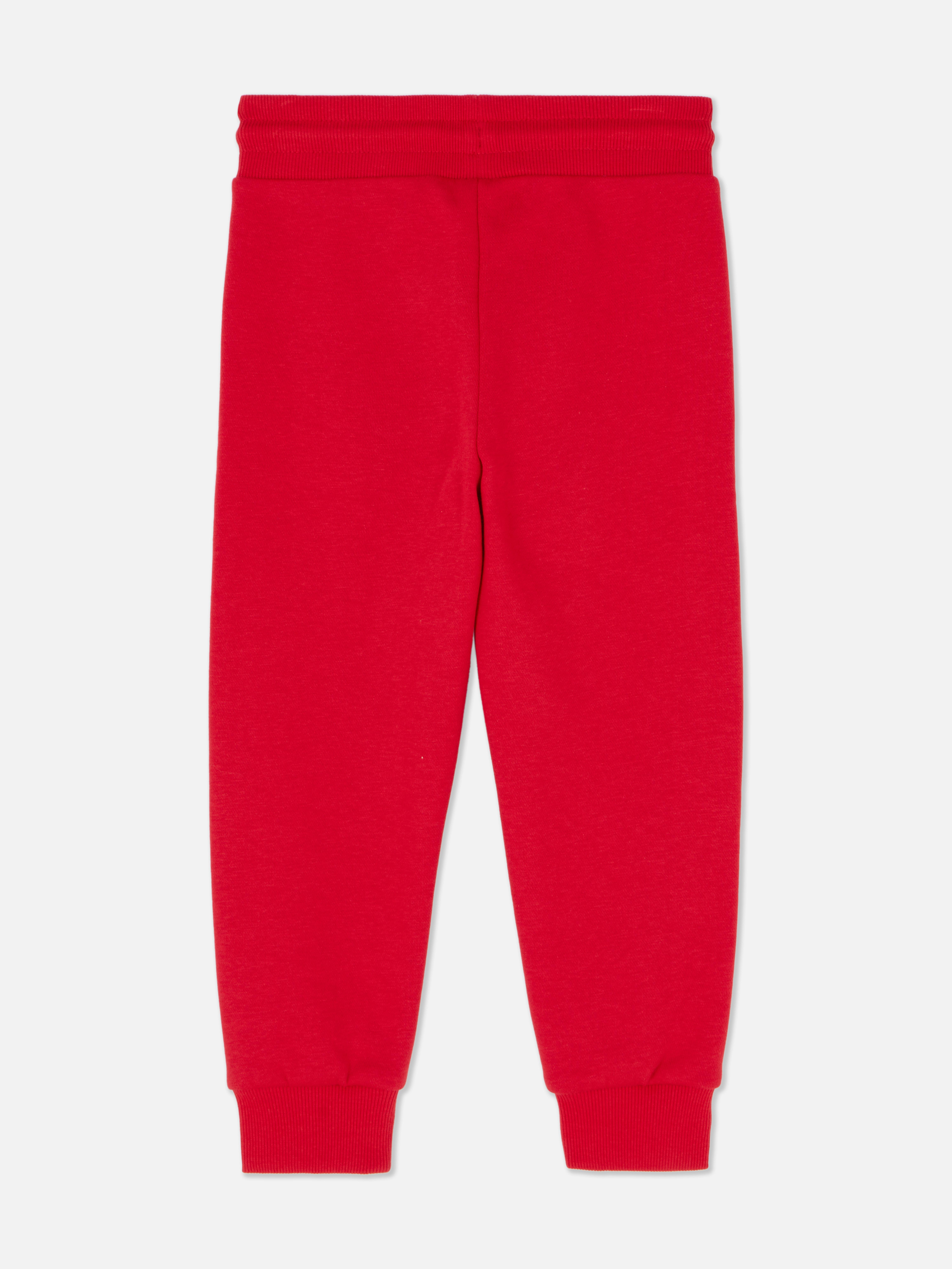 Passende Jogginghose mit Disney Cars-Print. Jogginghose mit Kordelzug, Bündchen an den Knöcheln und Prints von Cars-Figuren.