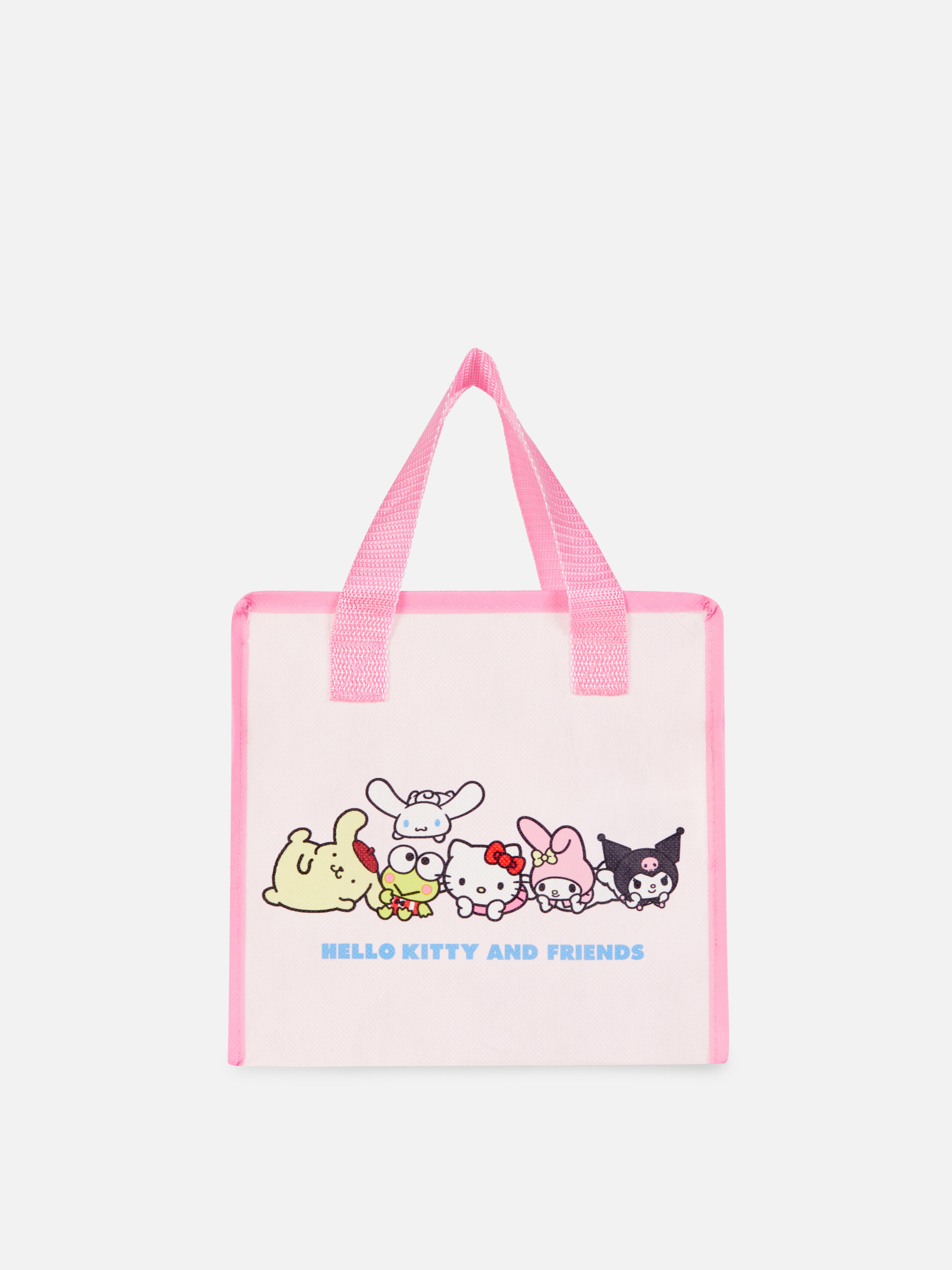 Geantă de prânz Hello Kitty și prietenii O geantă de prânz Hello Kitty cu curea de umăr și imprimeuri
