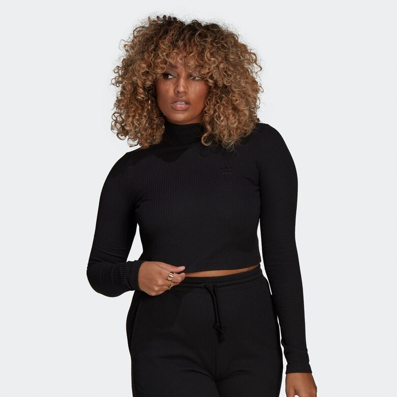 Cropped top met lange mouwen en ribstof, ideaal voor de winter.