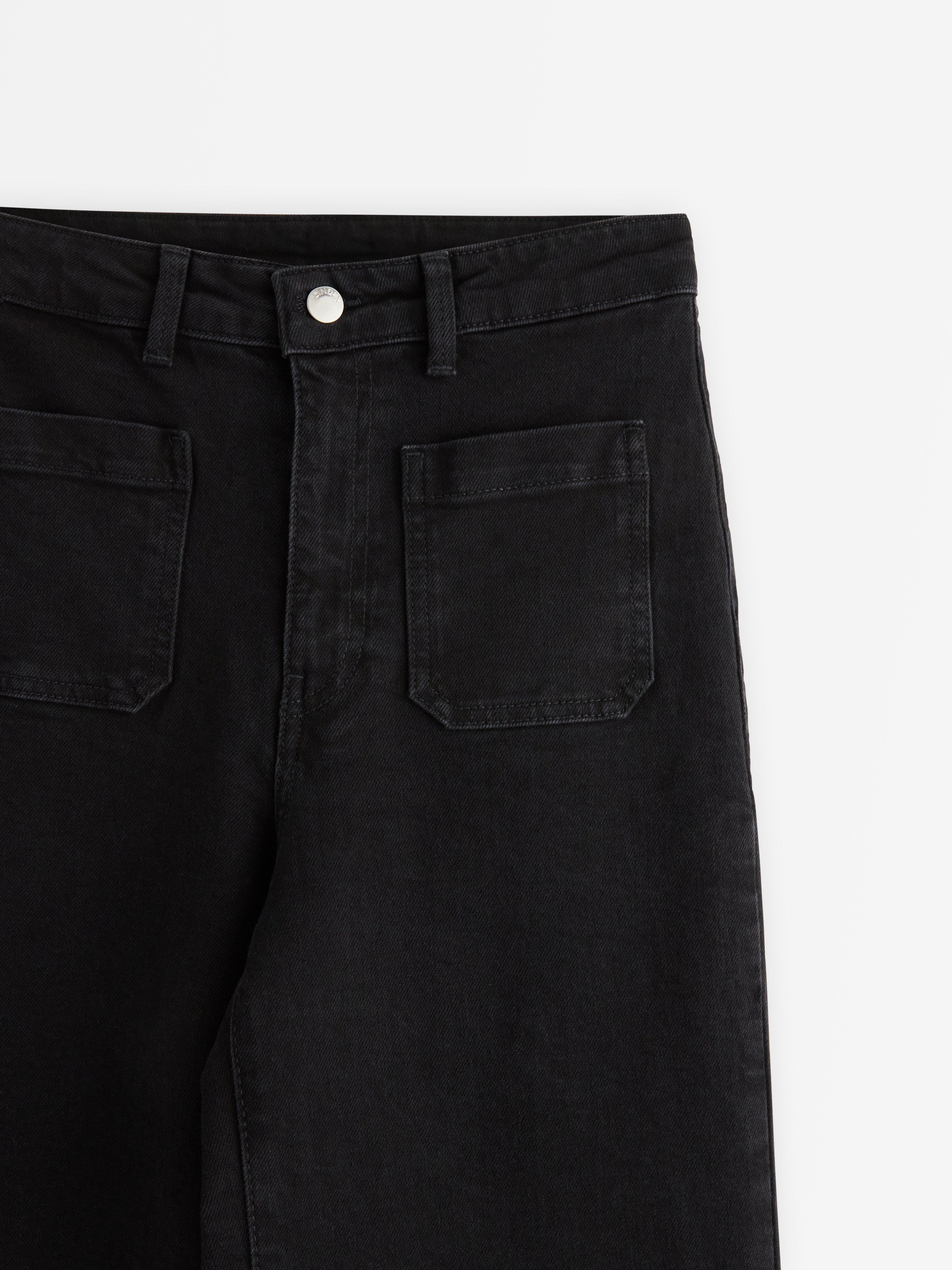 BREDE jeans med høy midje og lett stretch i svart denim