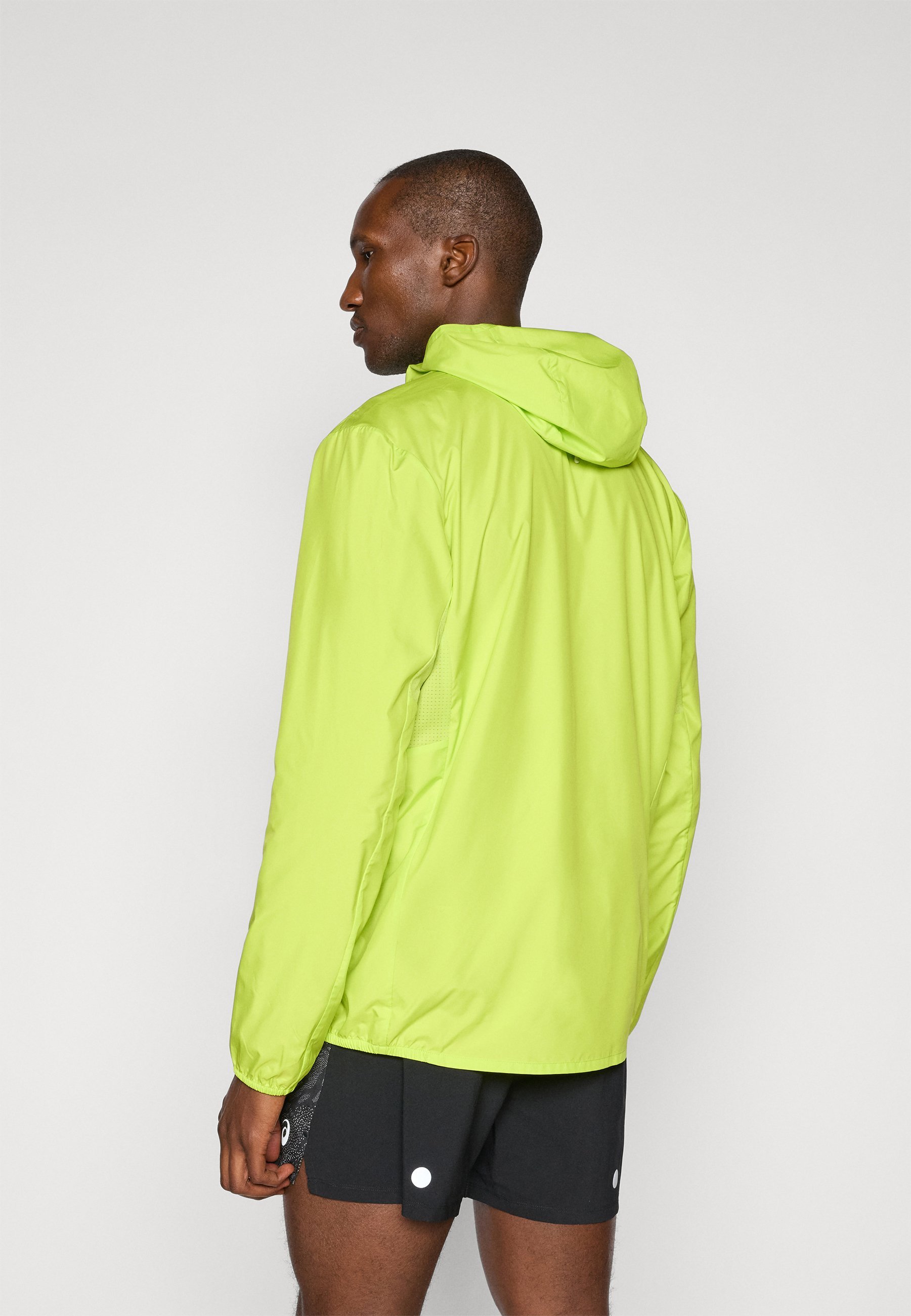 ASICS CORE JACKET - Windbreaker - neon lime