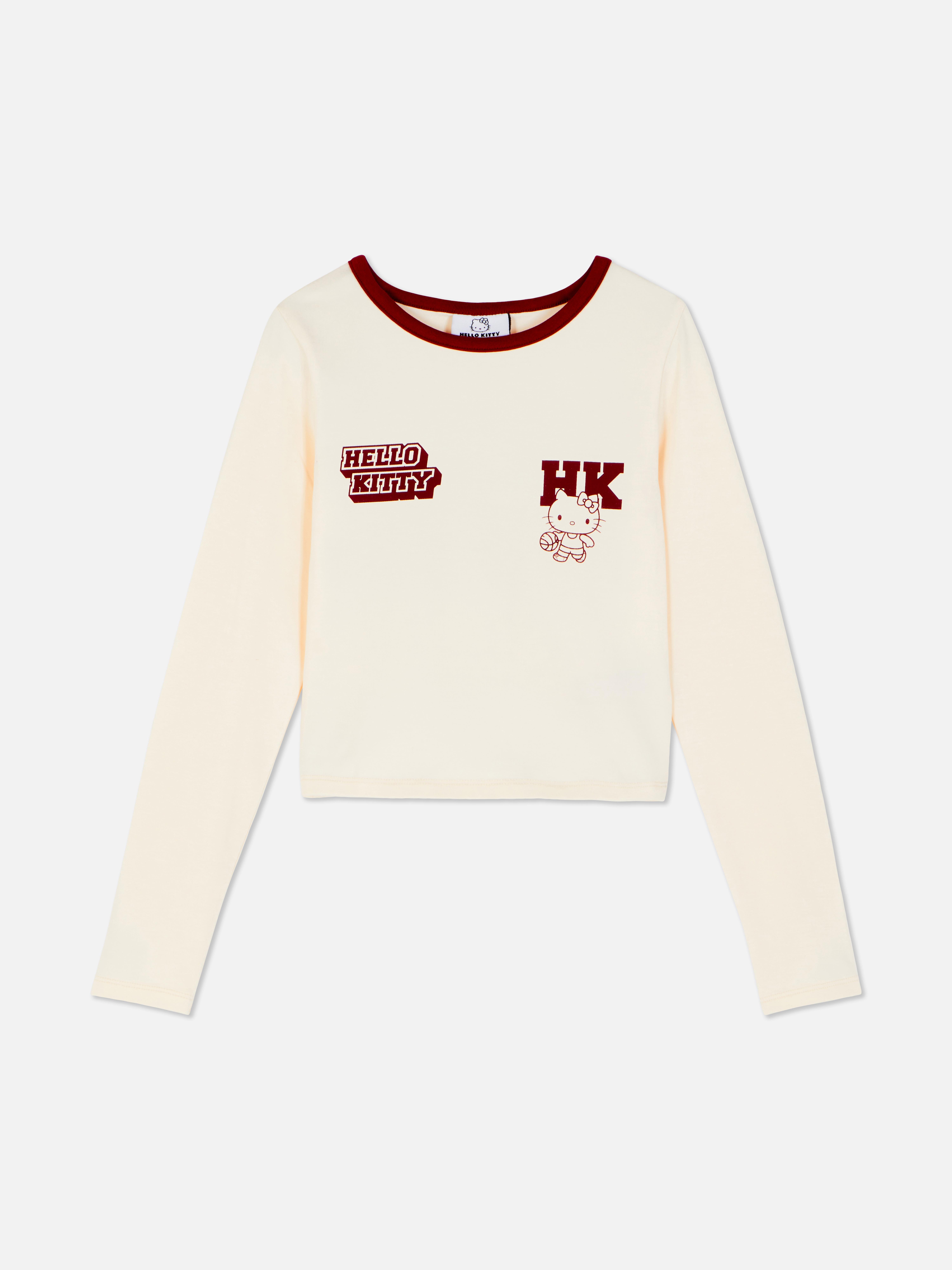 Langärmeliges T-Shirt mit Hello-Kitty-Aufdruck. Ein langärmeliges T-Shirt mit Abbildungen von Hello-Kitty-Figuren.