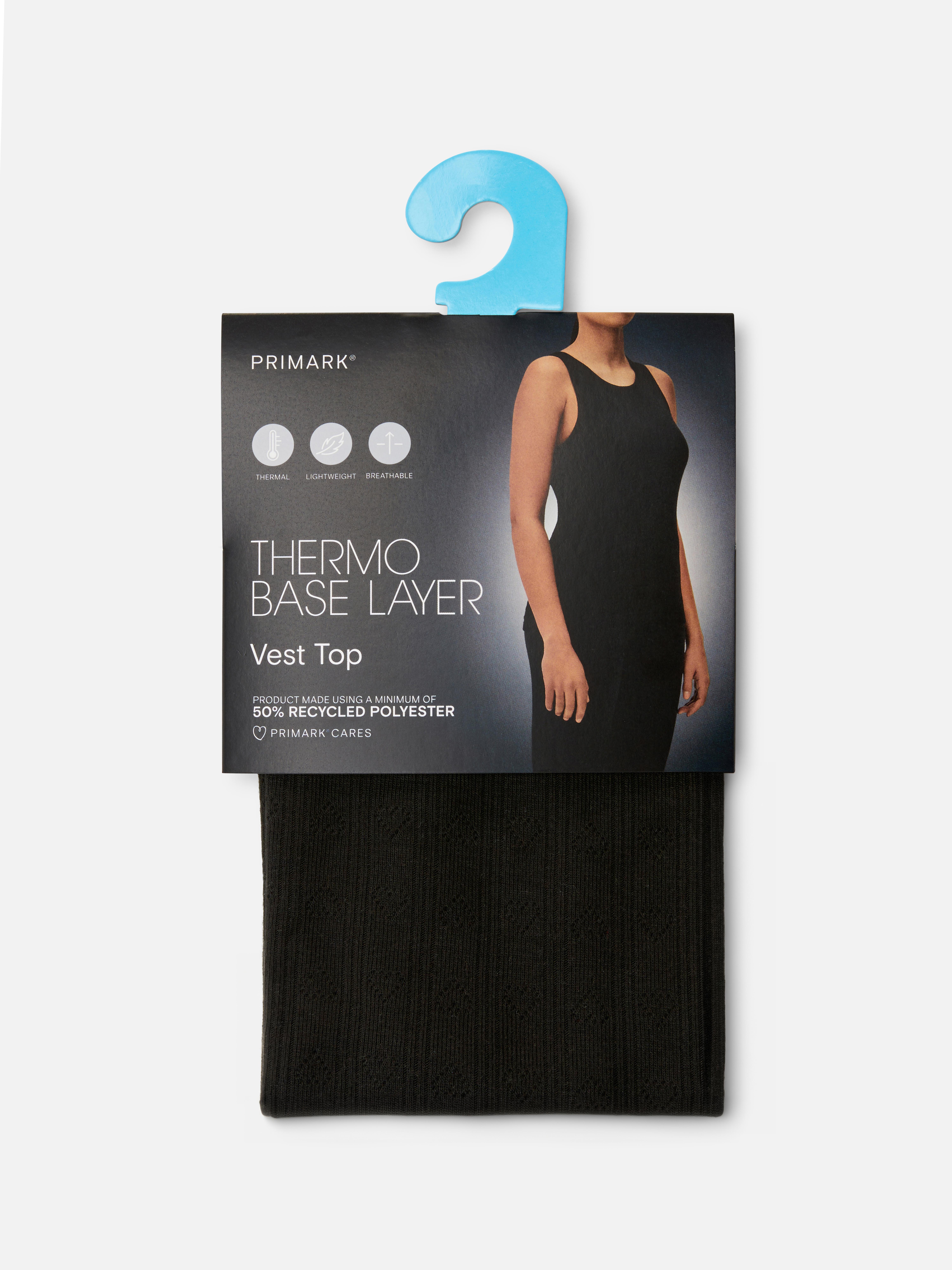 Thermoshirt mit Lochmuster. Halten Sie sich warm in dieser schmal geschnittenen Thermoweste mit gestricktem Lochmuster.