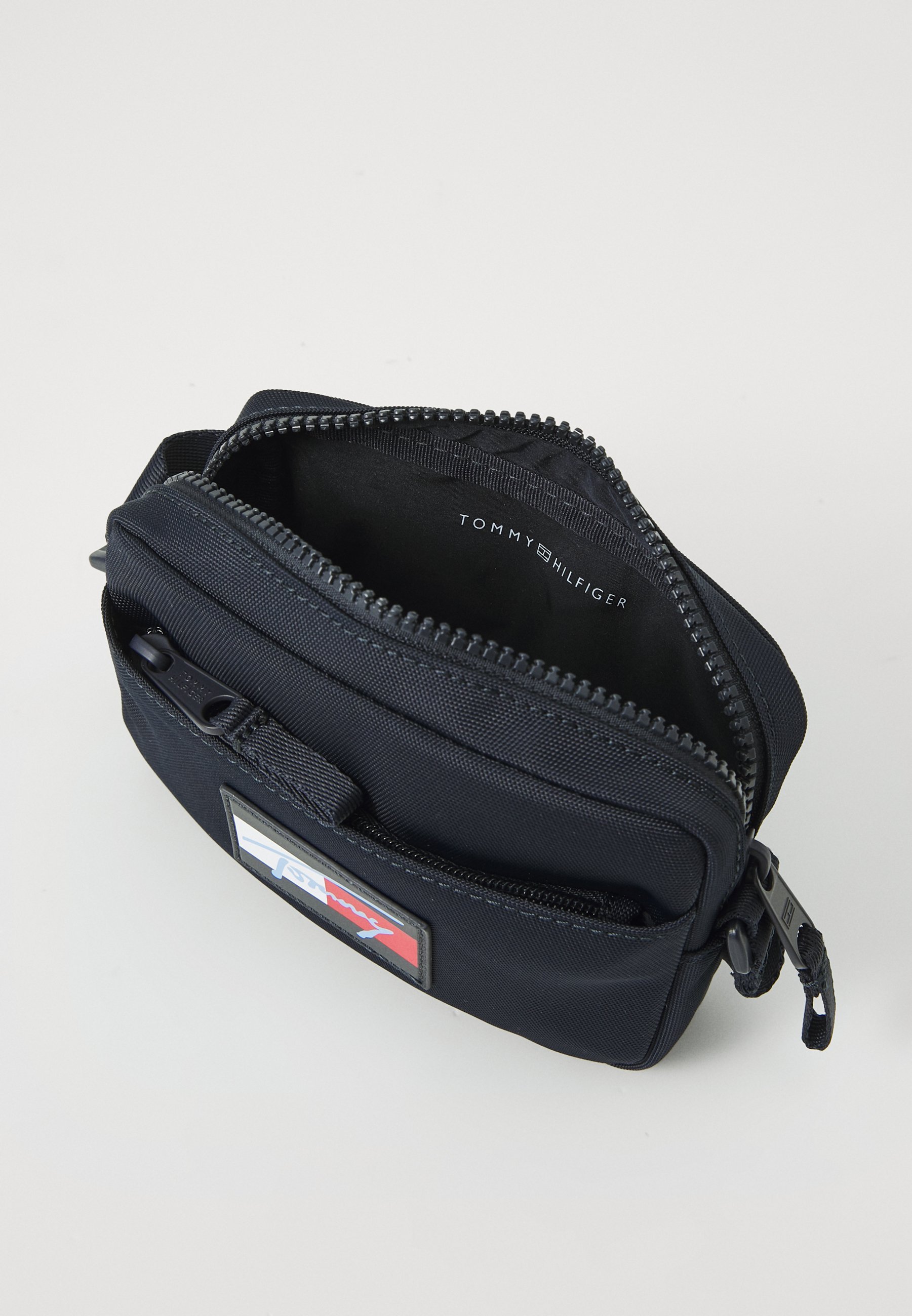 Tommy Hilfiger SCRIPT FLAG CROSSOVER TAS UNISEX - Crossbodytas - ruimteblauw