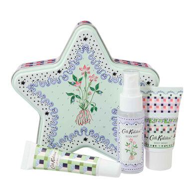 Cath Kidstonin tähdenmuotoinen peltilahjasetti käsillä ja huulilla, 1 kpl.
