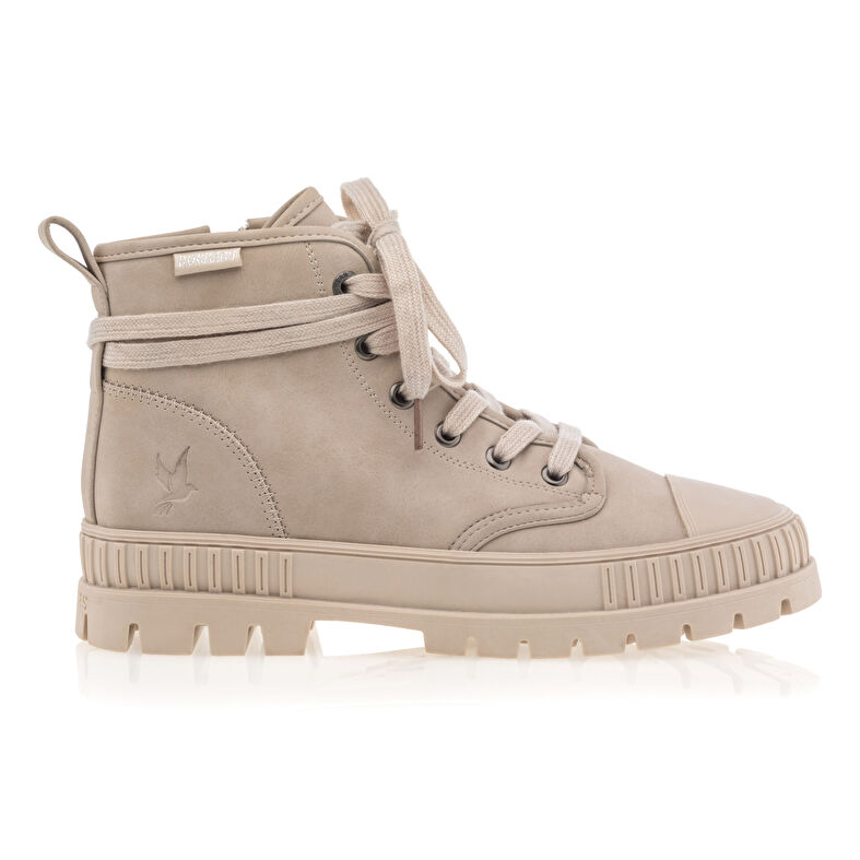 Zapatillas deportivas para mujer color beige.