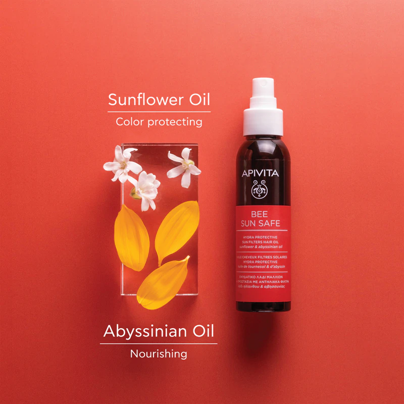 Apivita Bee Sun Safe Hair Oil ist ein Feuchtigkeitsöl für Haar, das den schädlichen Auswirkungen des Sonnenlichts ausgesetzt ist.