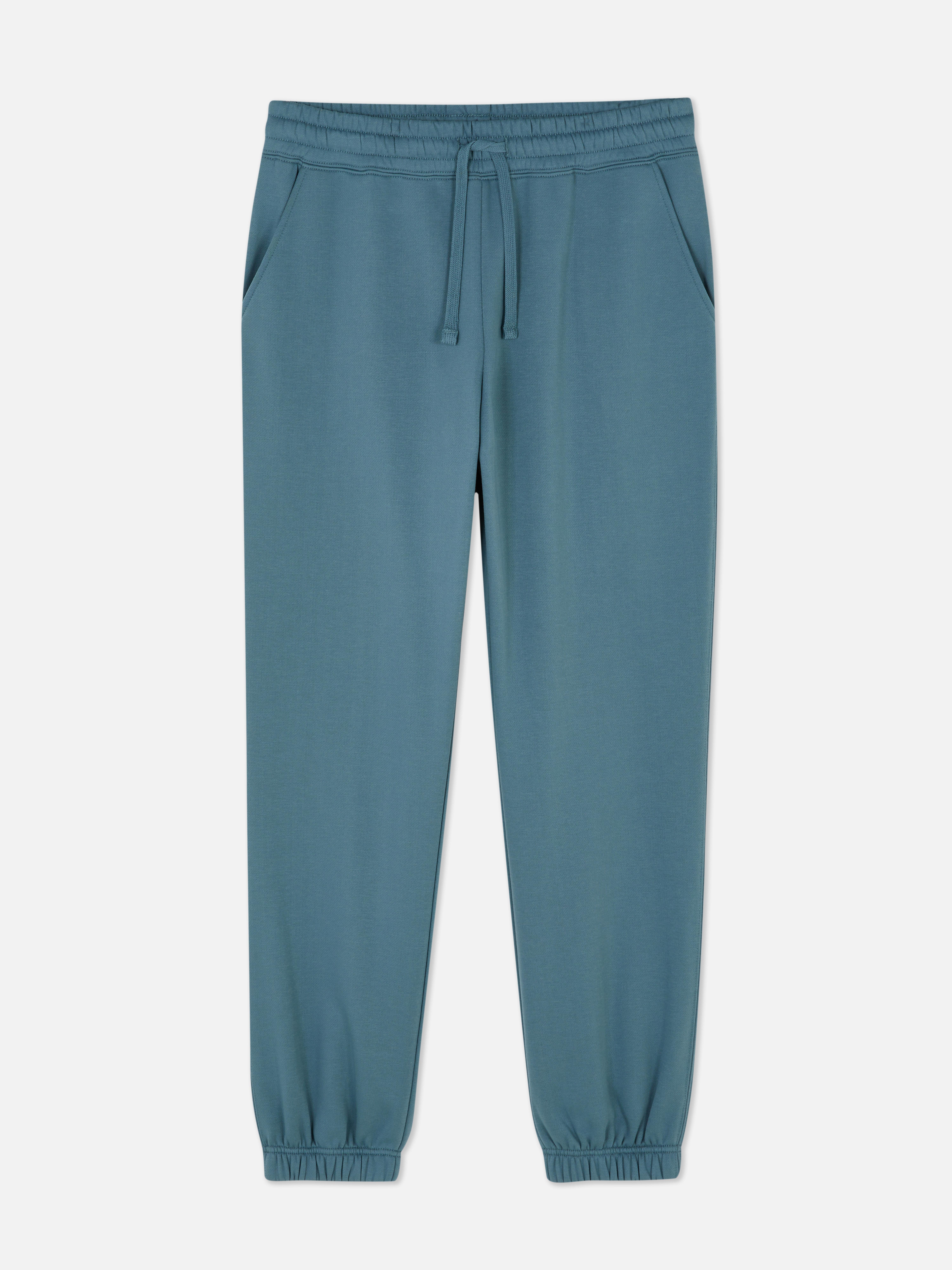Pantaloni de jogging simpli cu croială regulată. Acești pantaloni de jogging cu manșete până la gleznă sunt indispensabili în garderoba ta casual.