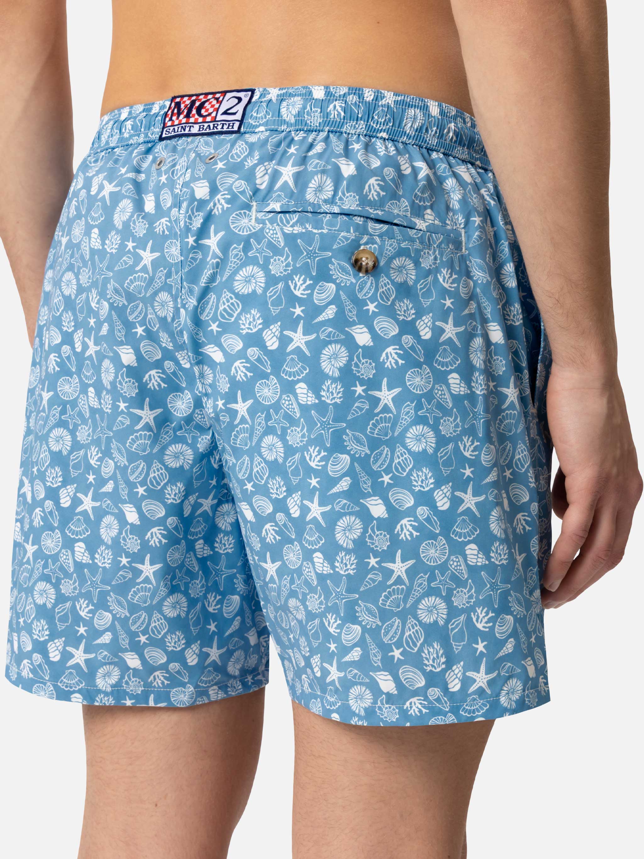 Comfortabel lichtgewicht badpak met tropische schelpenprint