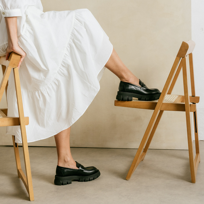 Mocassins à semelles crantées  en cuir glacé noir