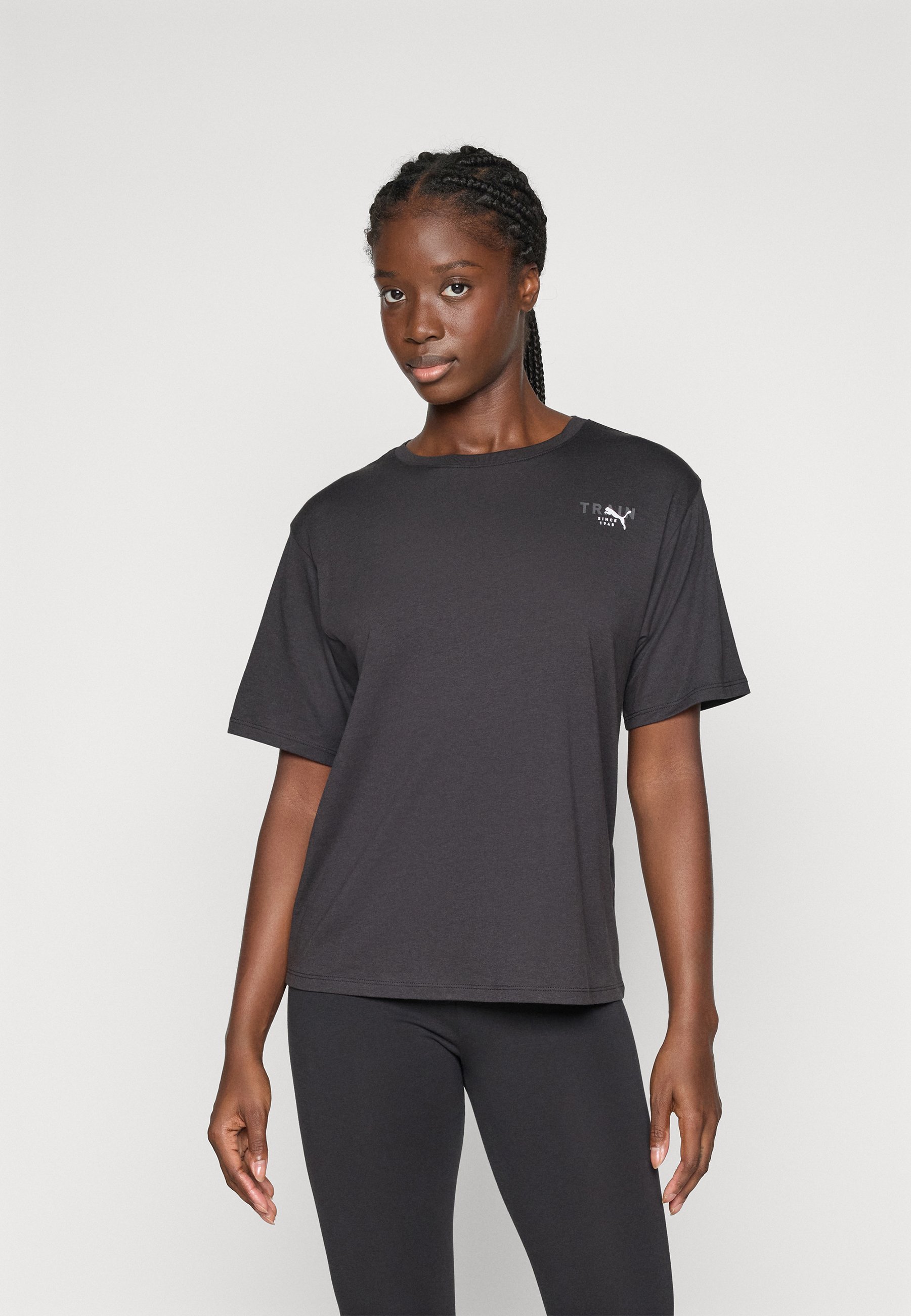 Puma PRETTY TOUGH GRAPHIC TEE - Sport T-shirt - zwart