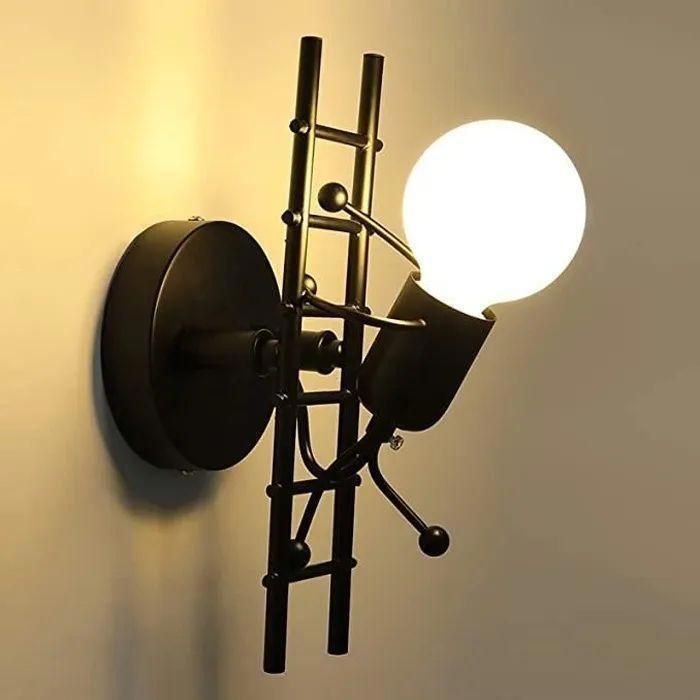 Aplique de pared interior UNI, diseño E27, lámpara de pared contemporánea con forma de humanoide en metal negro.