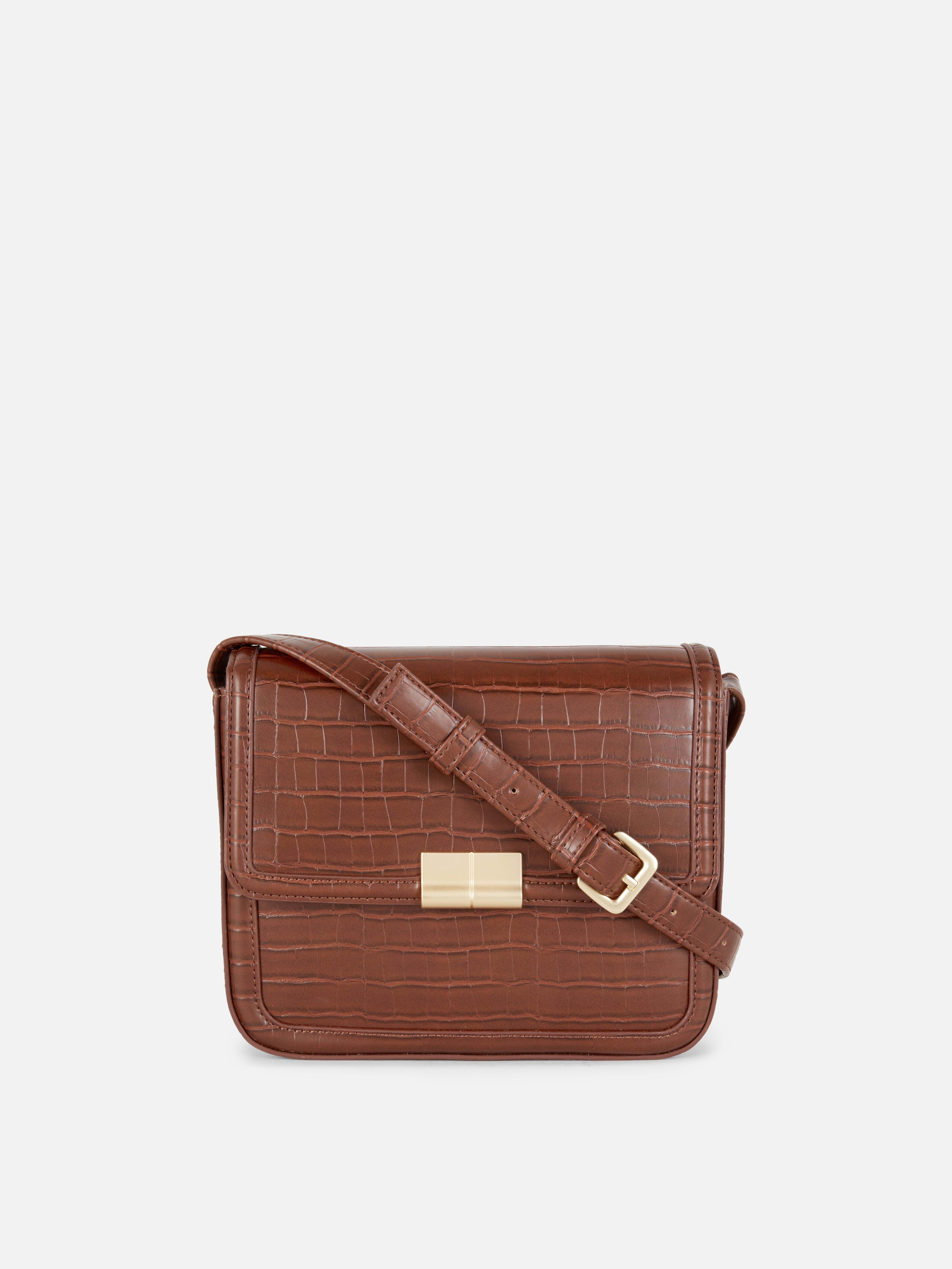Schultertasche aus Kunstkrokodilleder Stilvolle Outfits verlangen nach ebenso stilvollen Accessoires, wie dieser Schultertasche aus Kunstkrokodilleder mit praktischem Verschluss!