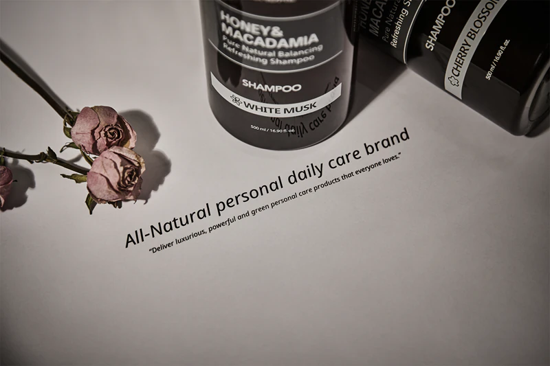Shampoo natural KUNDAL com mel e almíscar branco de macadâmia para cabelos secos e danificados.
