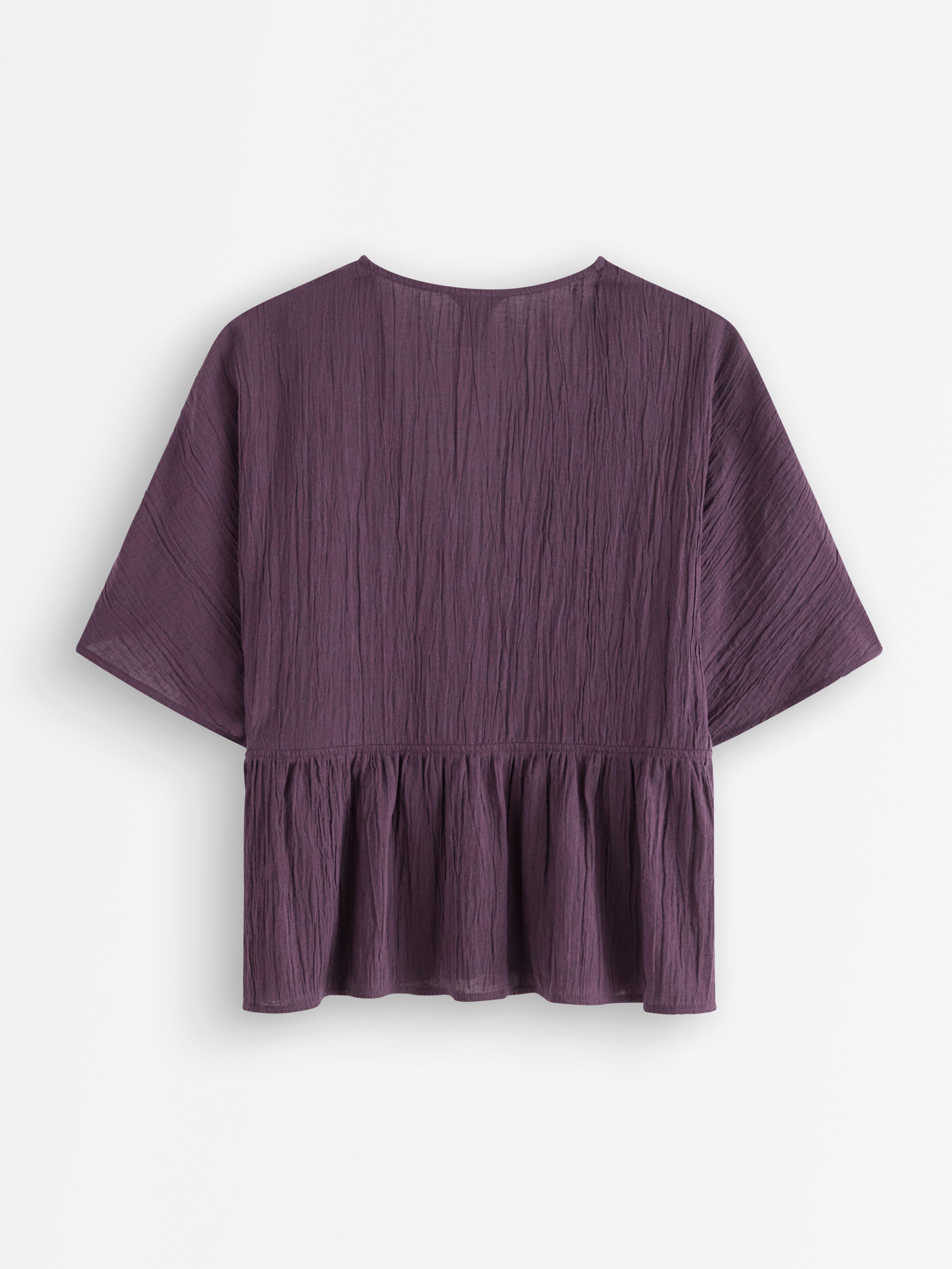 Blusa de manga corta color lila oscuro empolvado