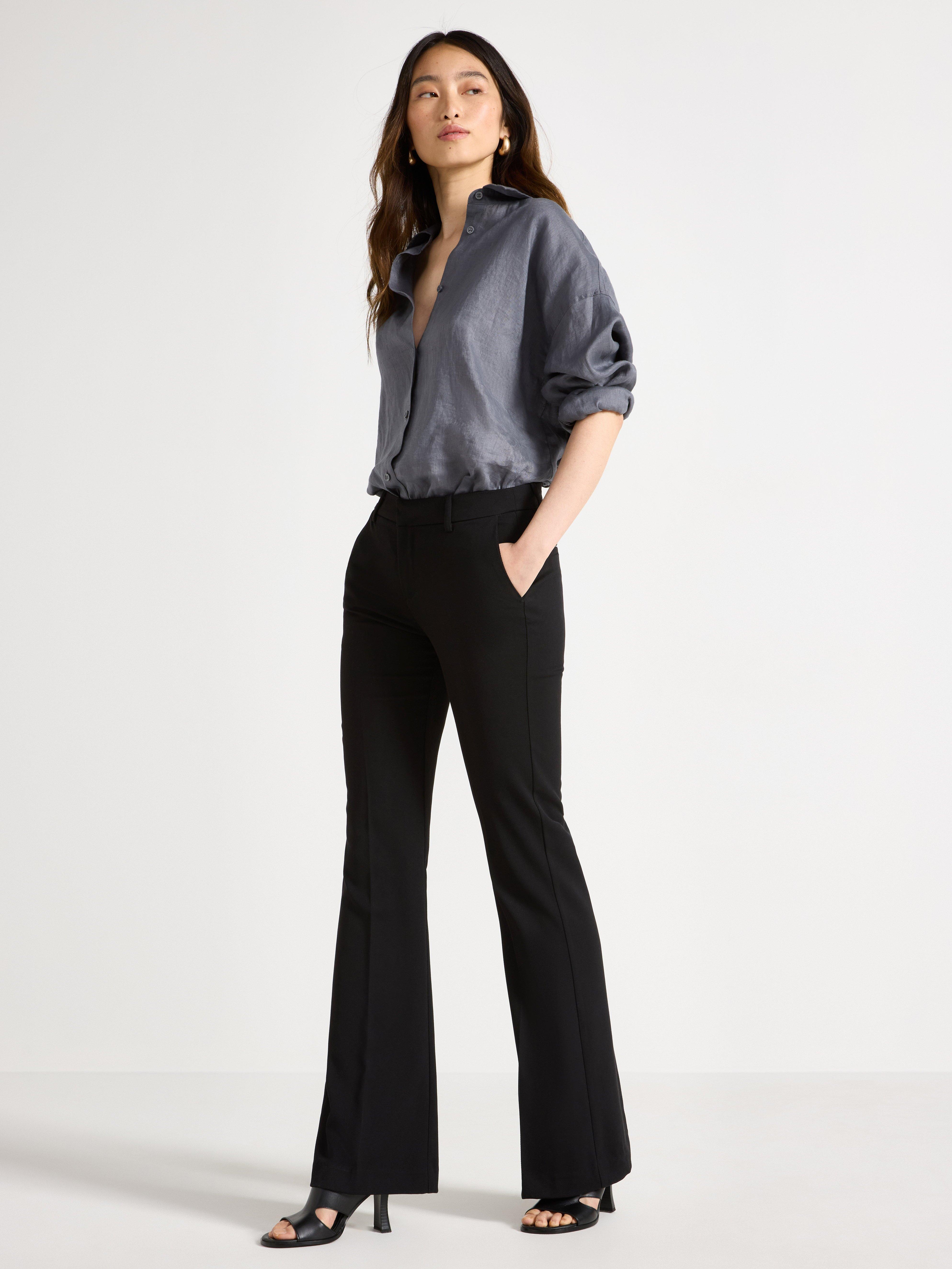 Pantalones acampanados FIONA con perneras extralargas, color negro.