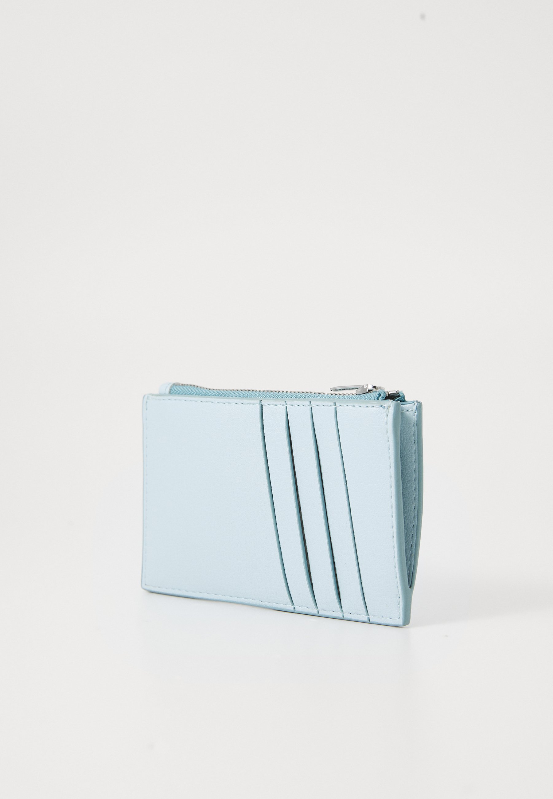 Calvin Klein portemonnee met reliëflogo - lichtblauw/vintage indigo