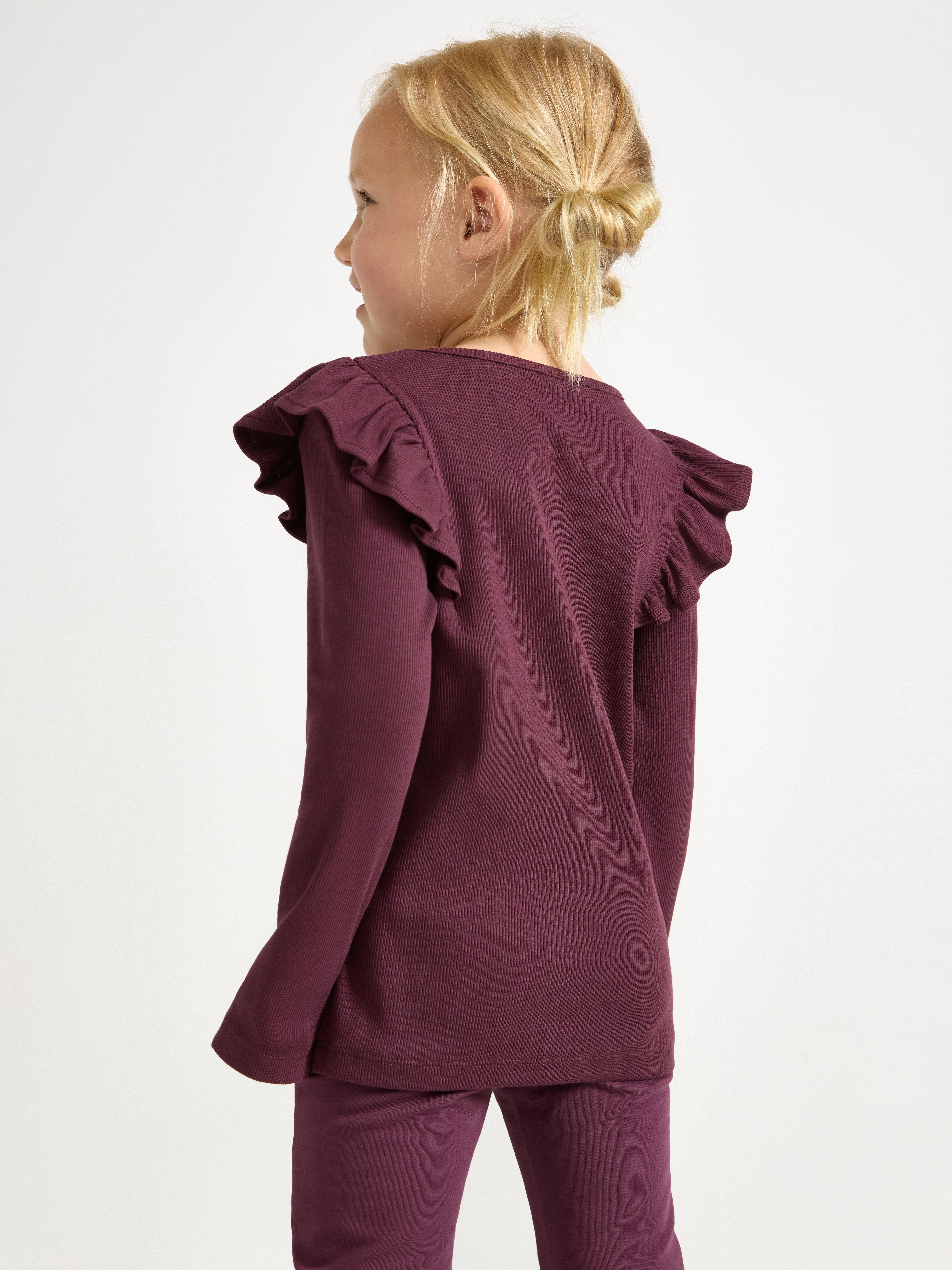 Top de manga larga color lila oscuro empolvado