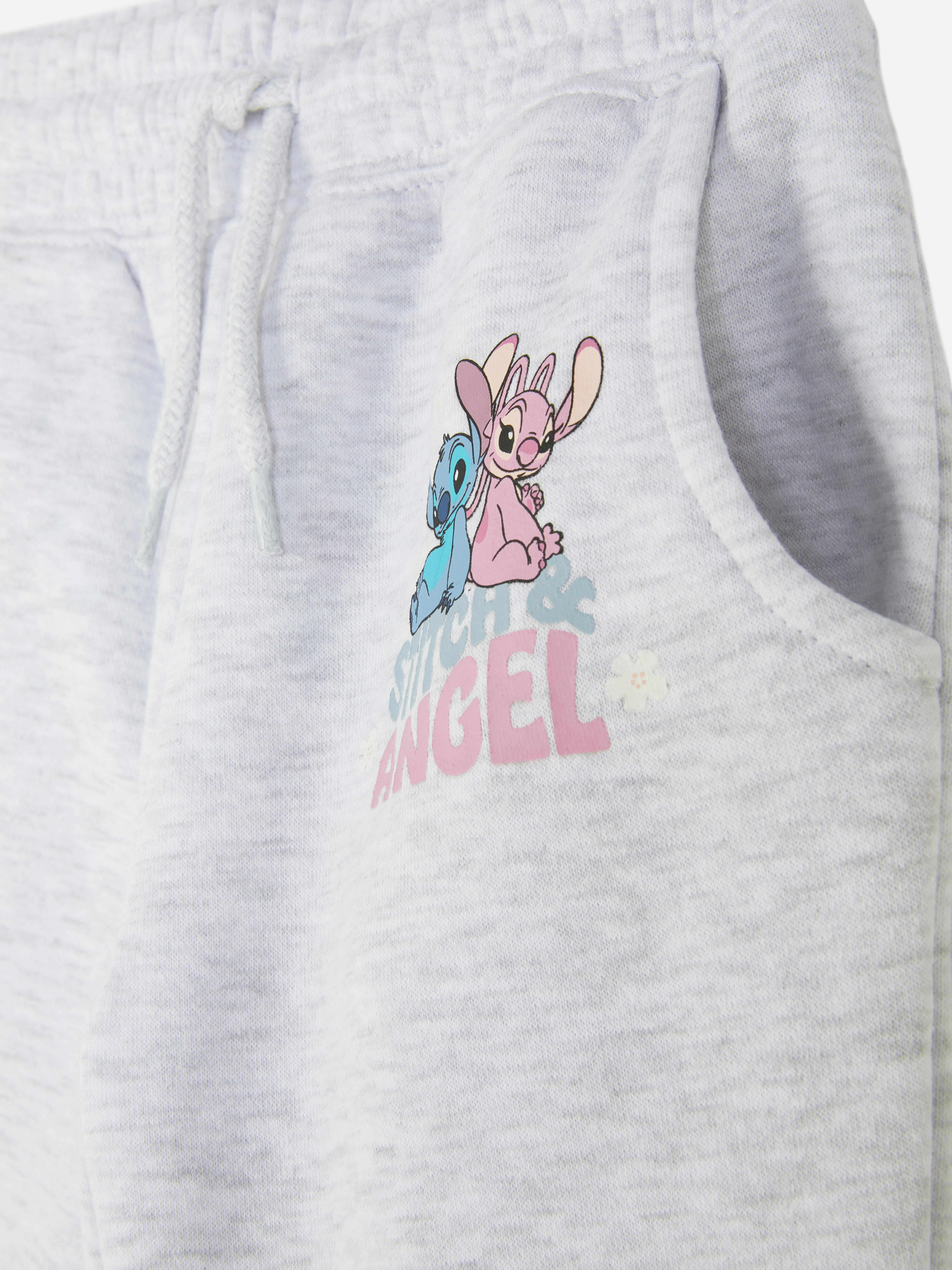 Pantaloni de trening Disney Stitch O pereche de pantaloni de trening cu talie elastică și imprimeu cu Stitch și Angel pe față