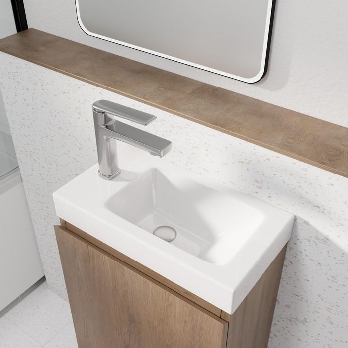 Mueble de baño básico con acabado en madera, 40x50x22 cm, con lavabo SMC blanco.