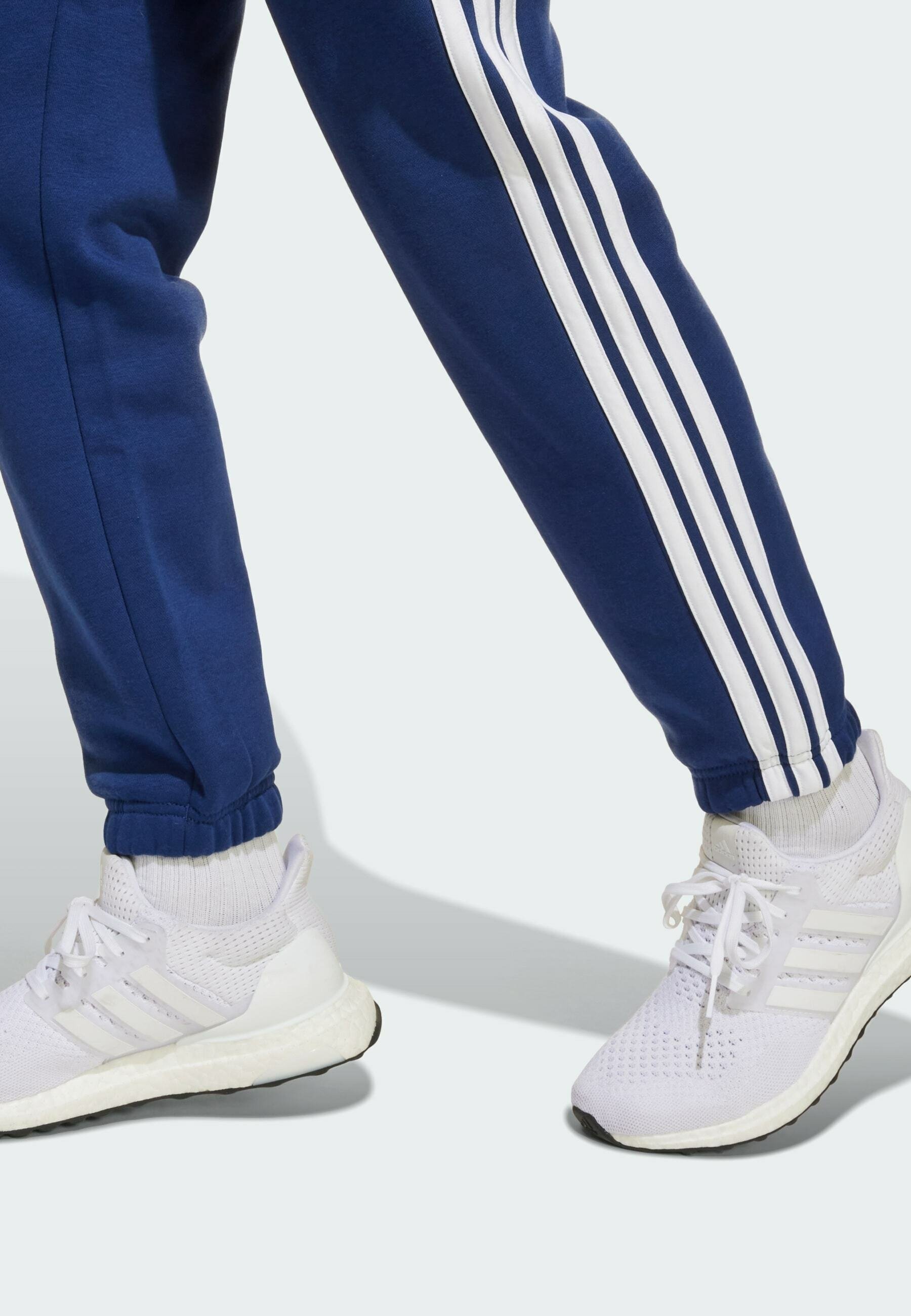 Adidas Performance ESSENTIALS UNISEX - Pantaloni della tuta - blu scuro bianco