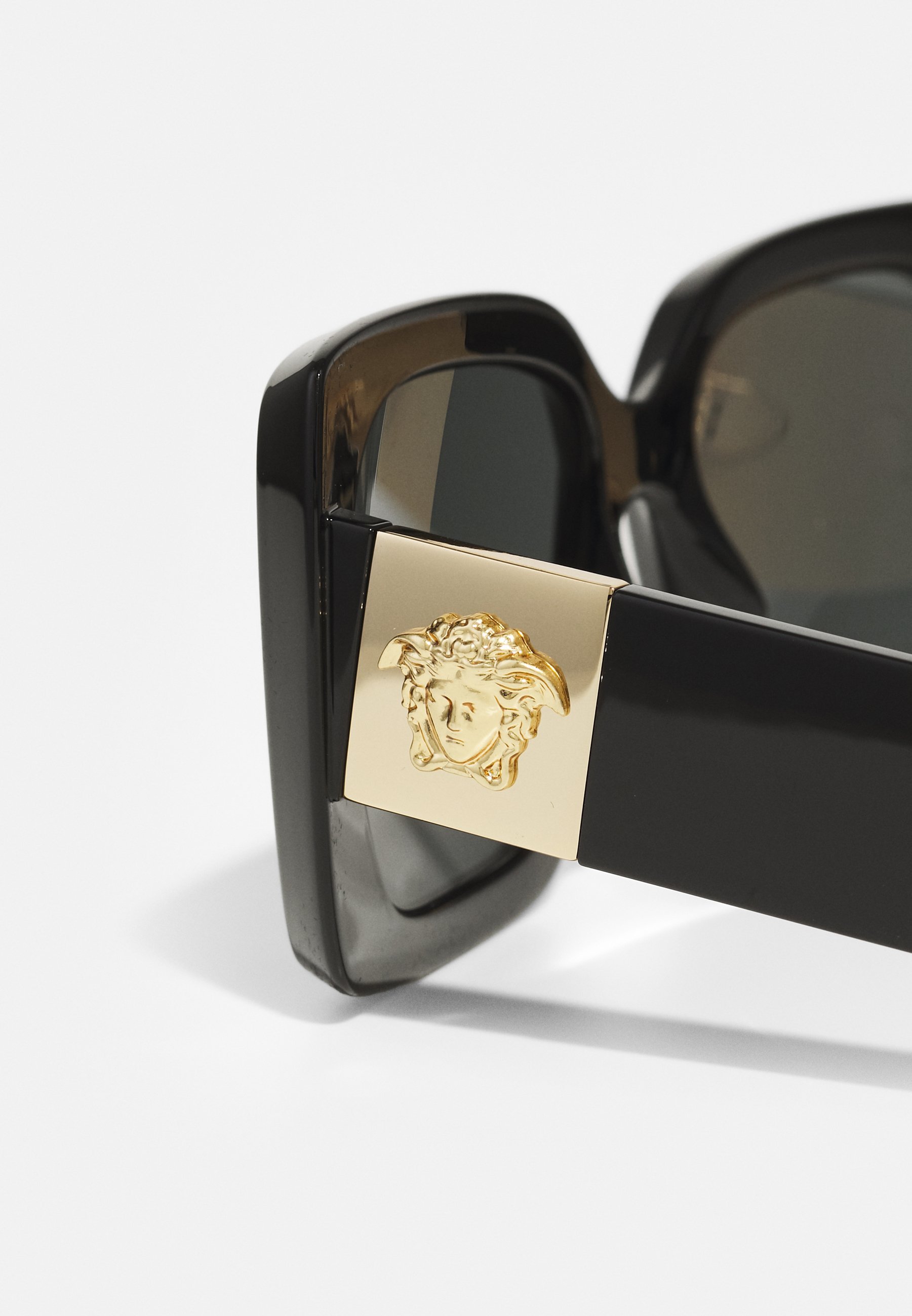 Lunettes de soleil Versace - noir/gris foncé