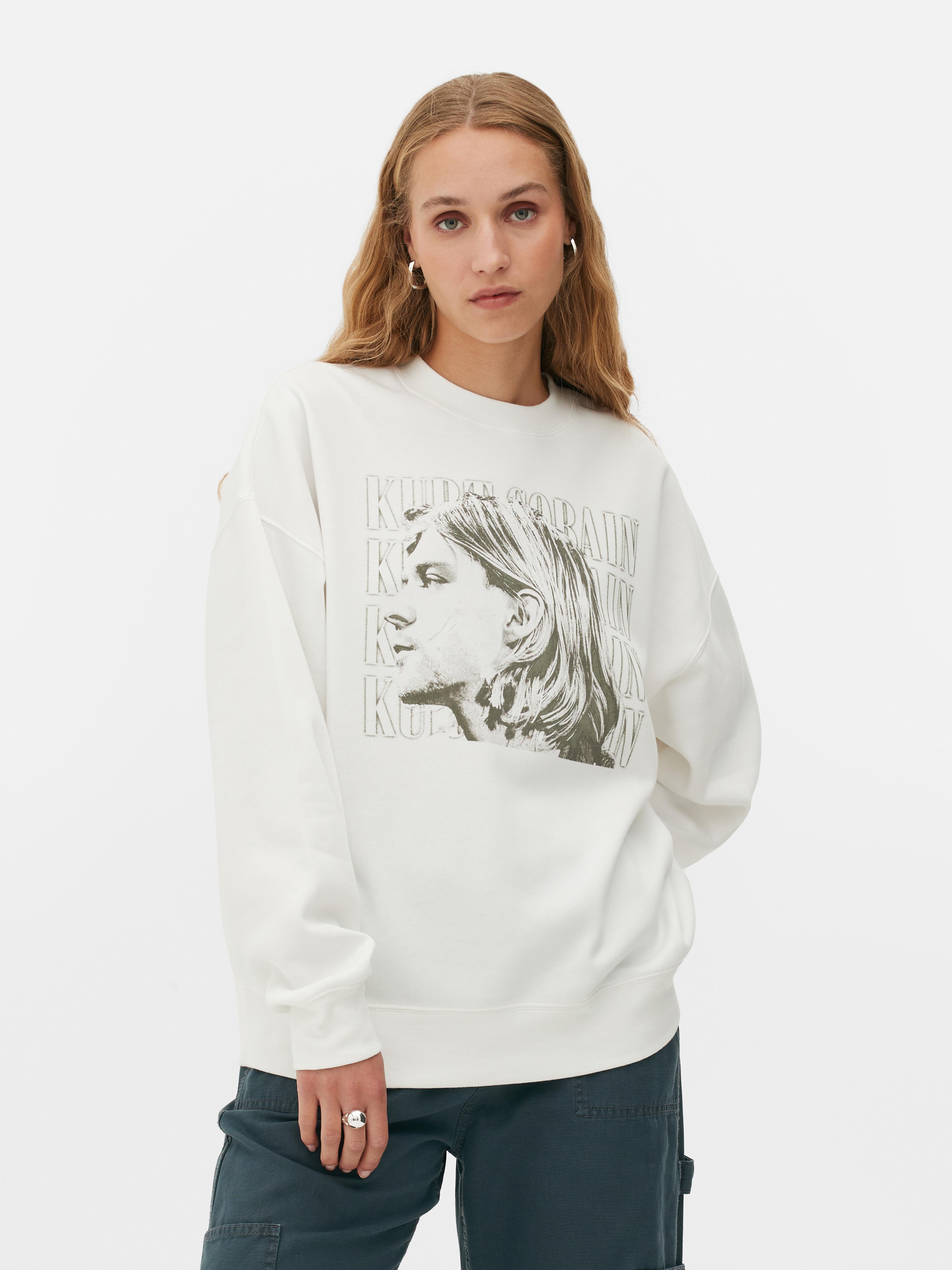 Hanorac cu imprimeu Kurt Cobain. Acest hanorac cu guler rotund Kurt Cobain aduce la viață era grunge.