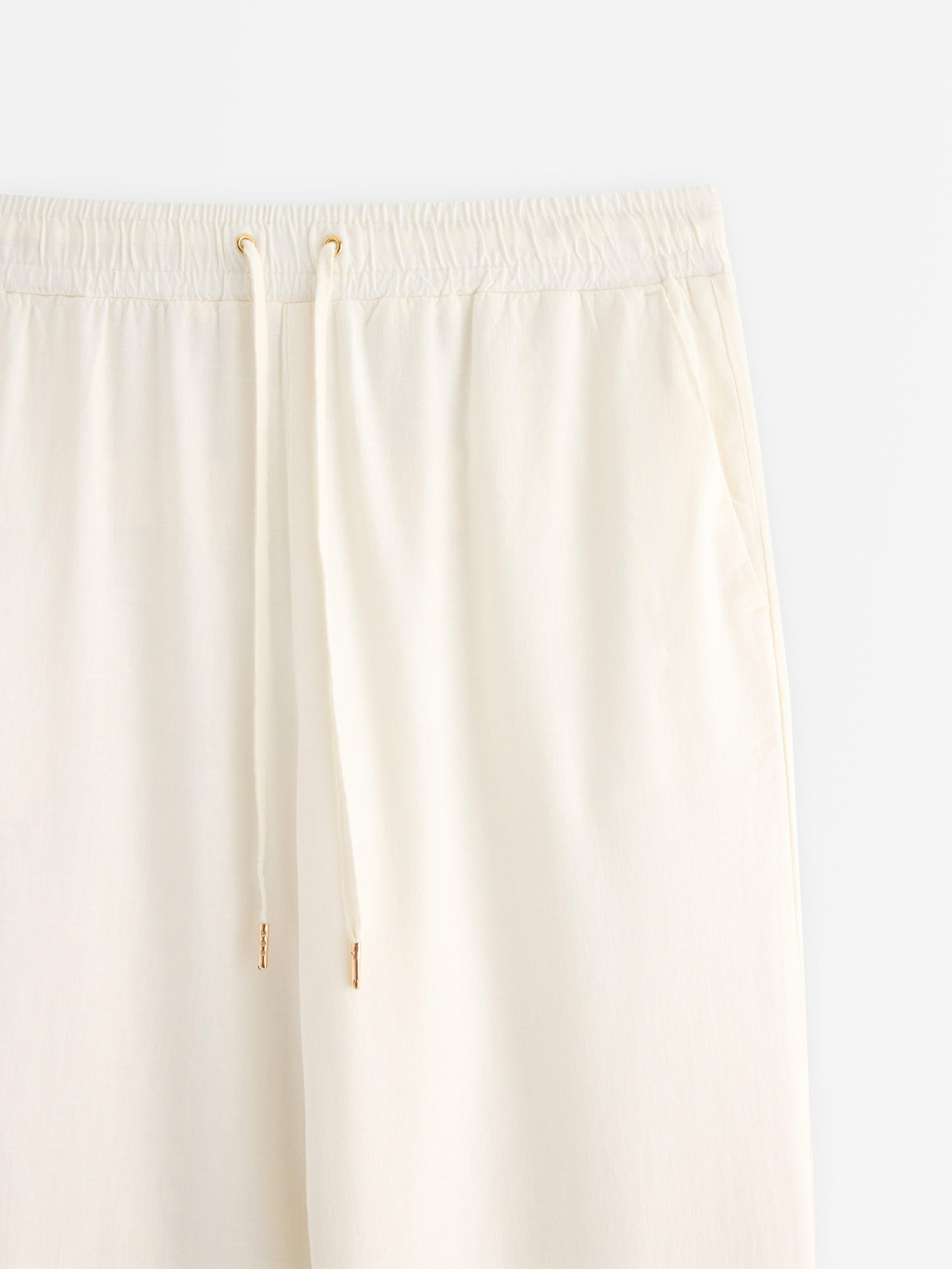 AVA croppade tapered byxor i linneblandning Off White