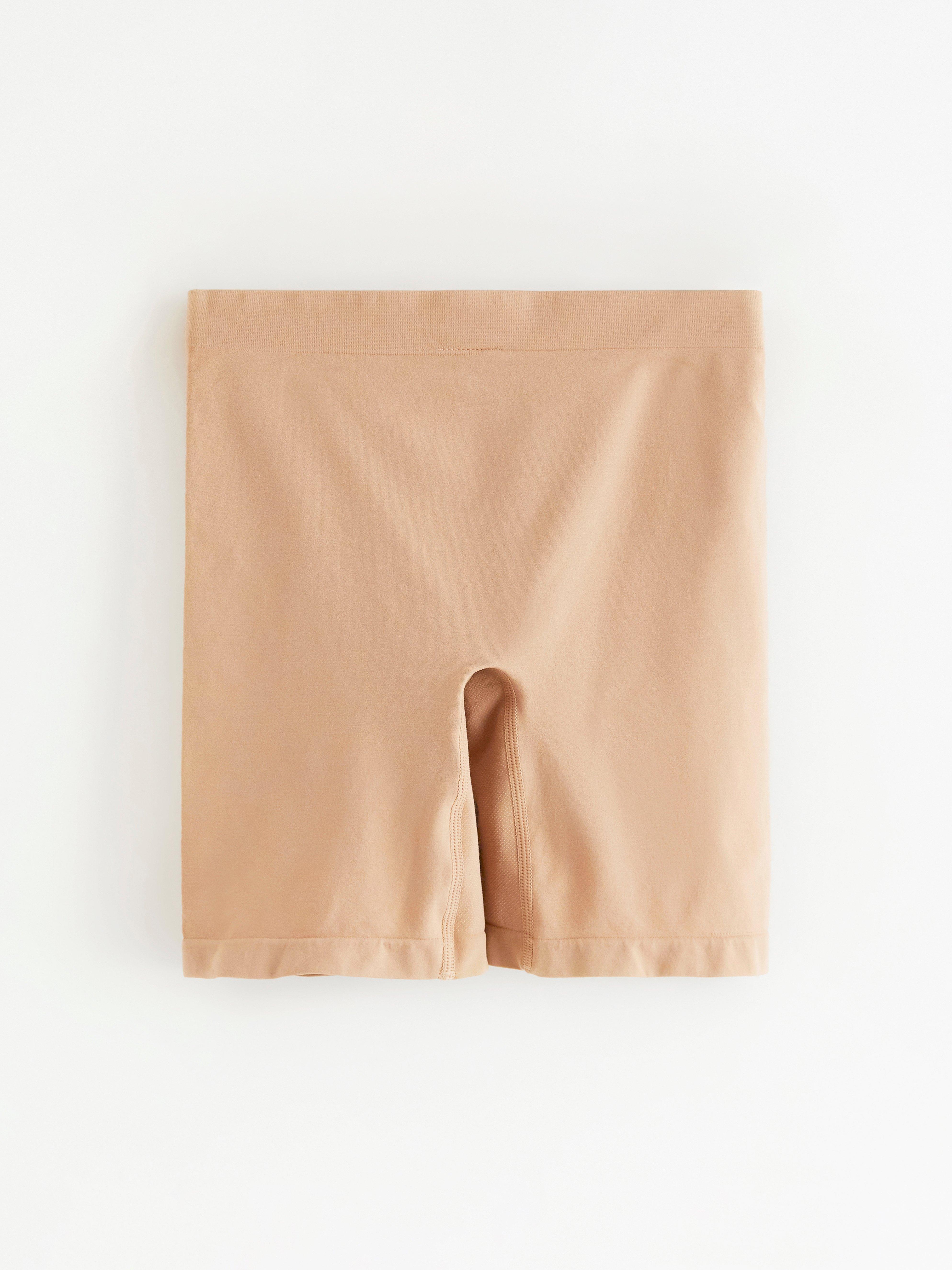 Pantalones cortos de ciclista de talle alto sin costuras, color beige.