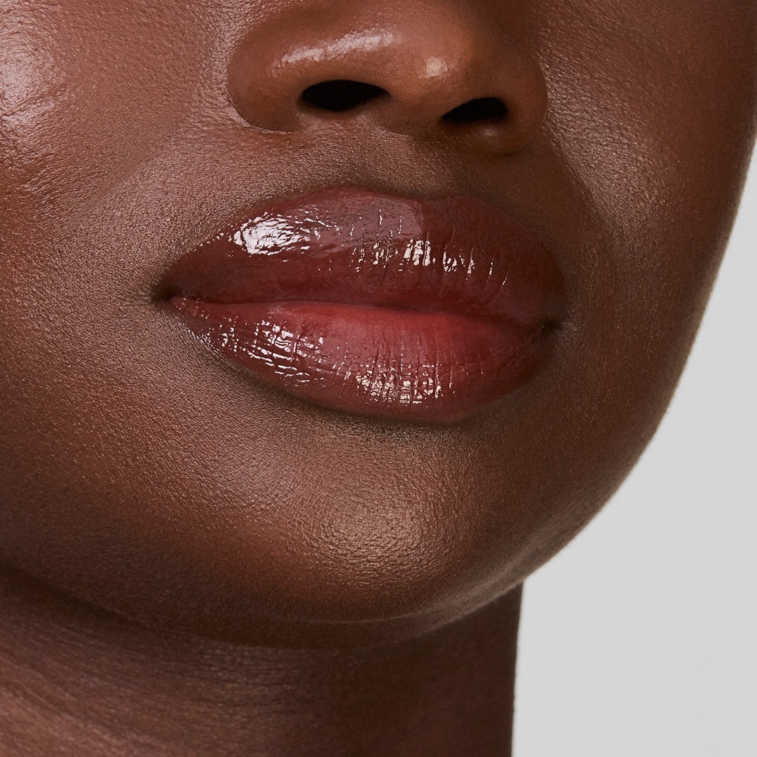 Estée Lauder sjajilo za usne Pure Color Melt-on sjajilo u stiku - 1,8 g