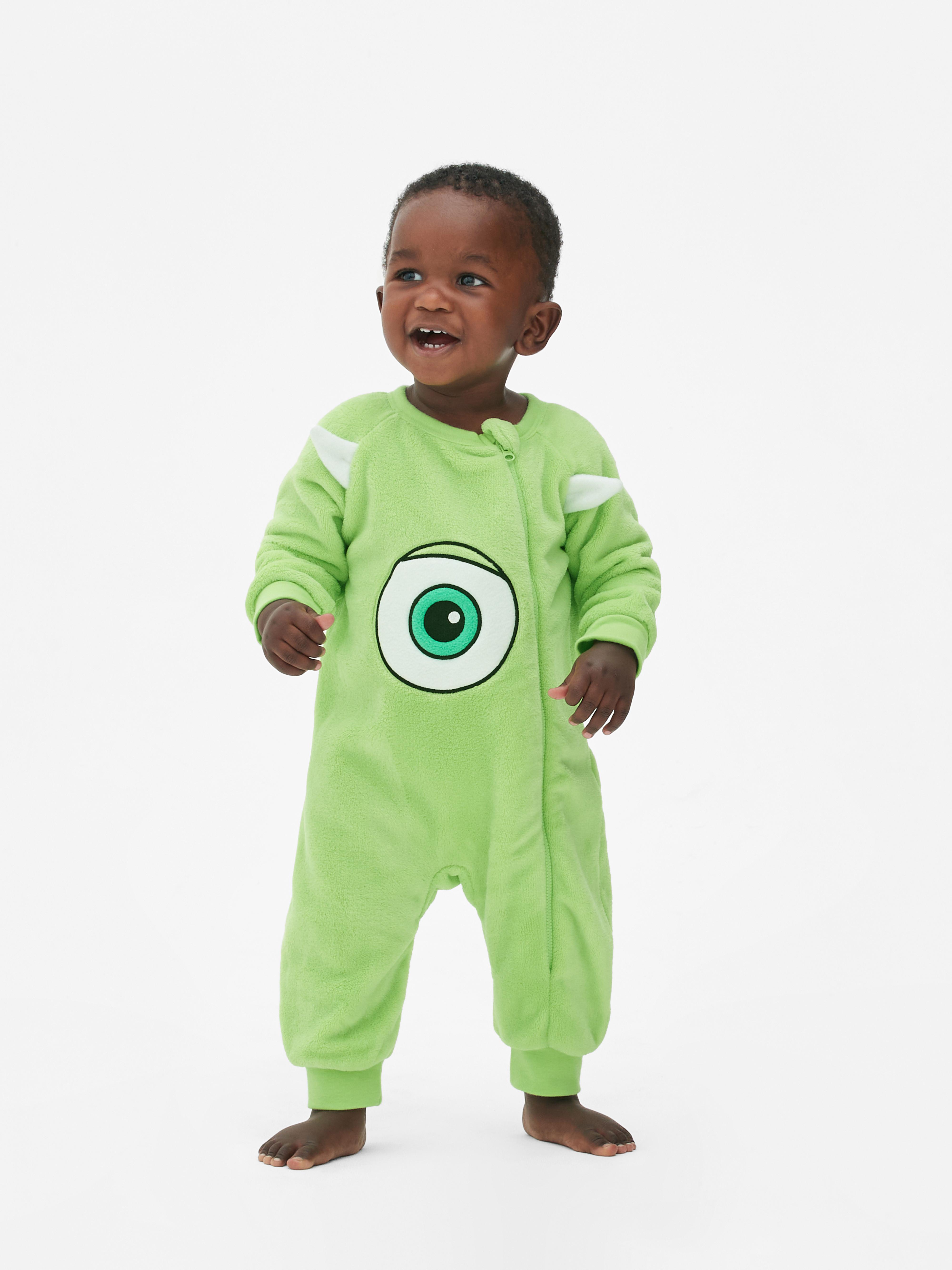 Salopetă din fleece cu fermoar pentru bebeluși Monsters, Inc. O salopetă pentru bebeluși de la Monsters, Inc. cu coarne și un ochi ca al curajosului Mike Wazowski